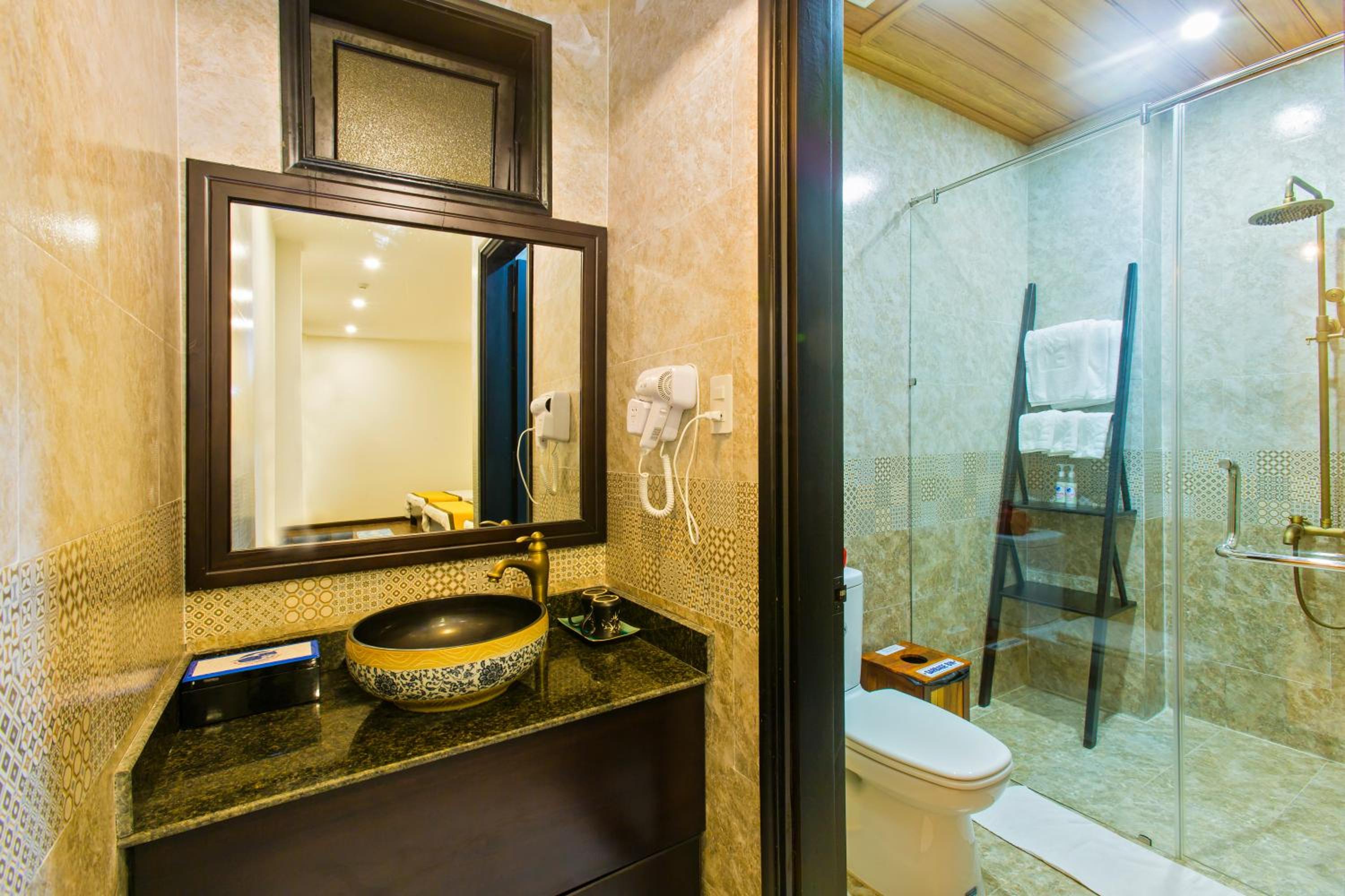 Deluxe Triple Room - Photo 11