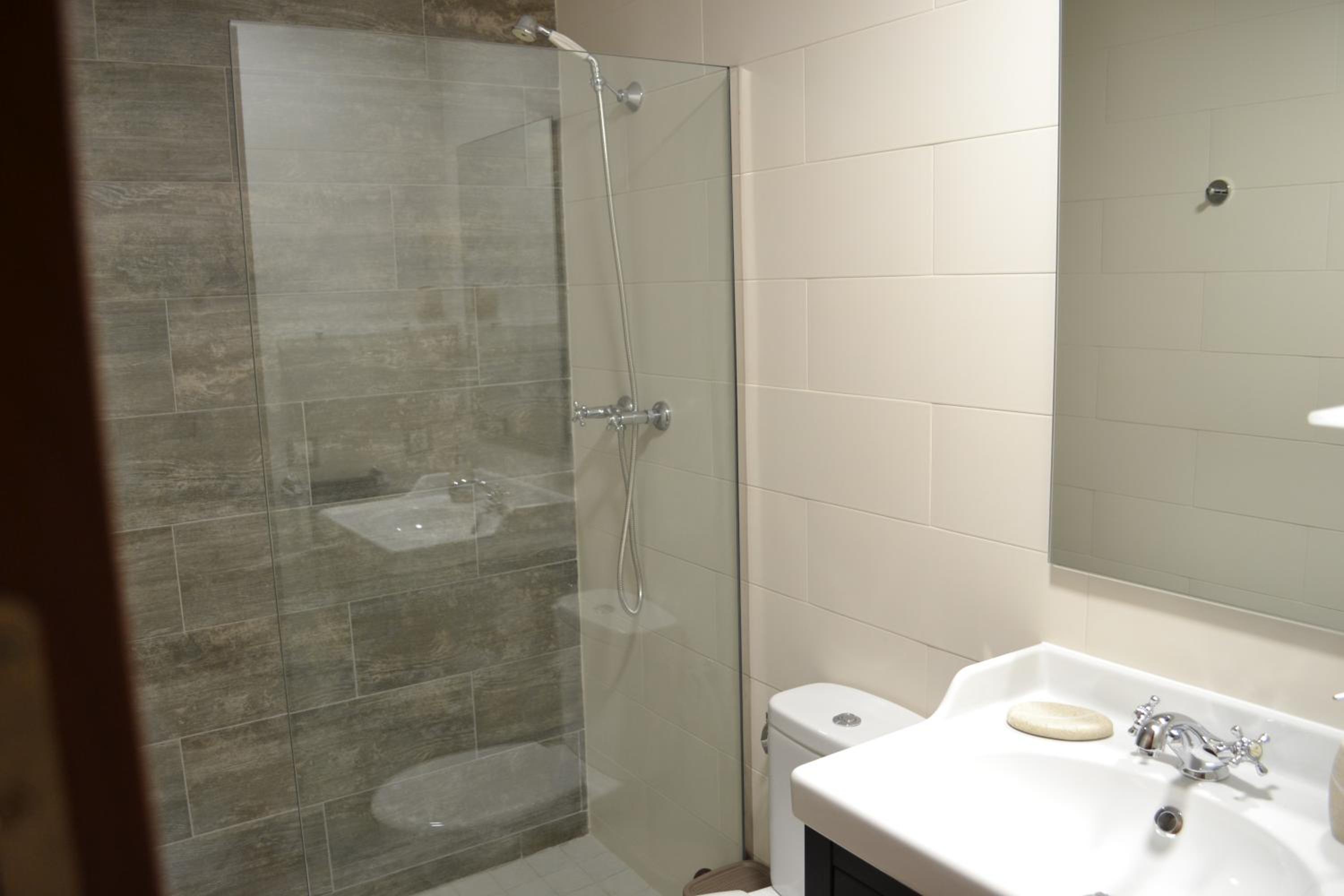 Three-Bedroom Apartment - Photo 19