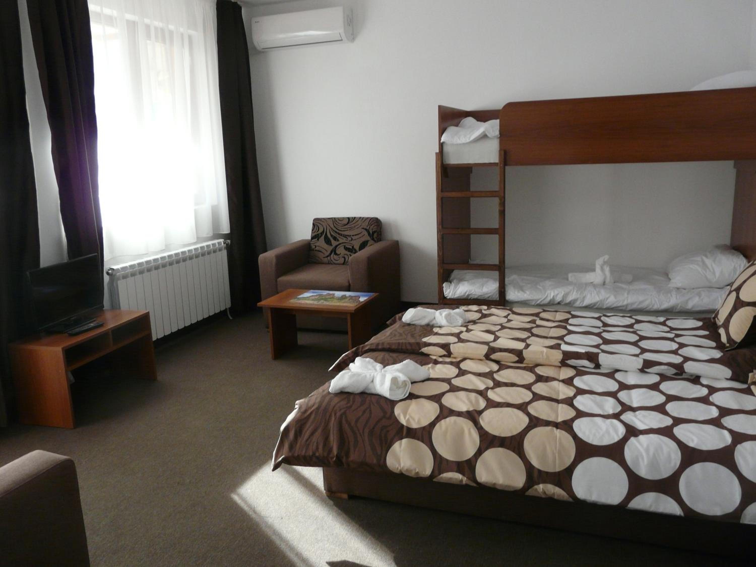 Double Room with Bunk Bed and Balcony (2 Adults + 2 Children) photo 1