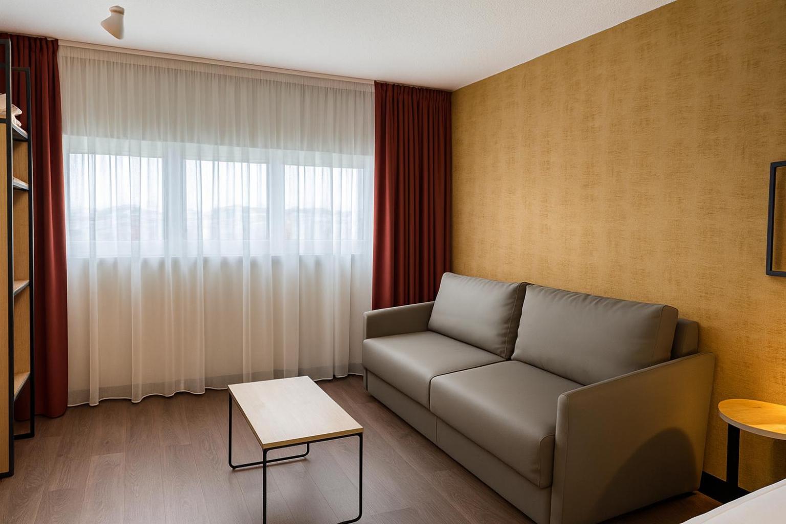 Premium Room with 1 King Bed and 1 Sofa Bed - Photo 3