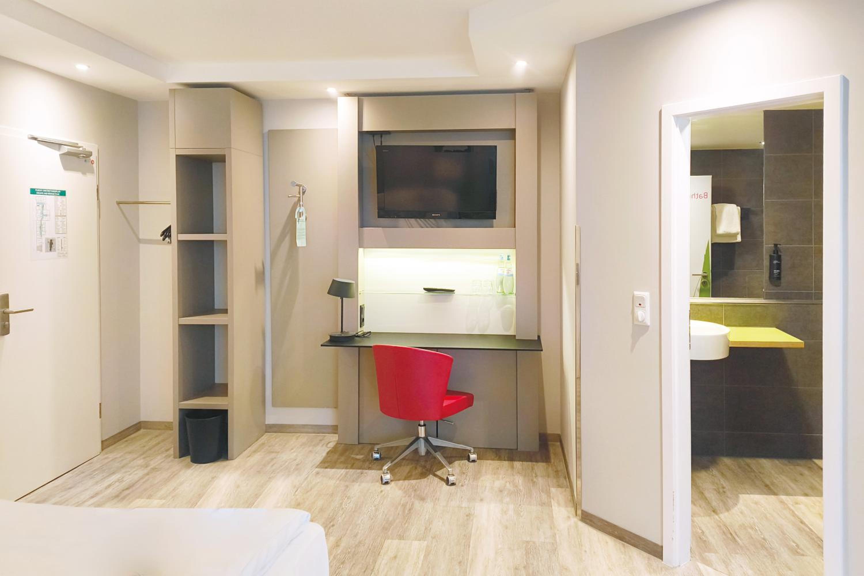 Premium Family Room with One Queen Bed and Two Twin Beds
