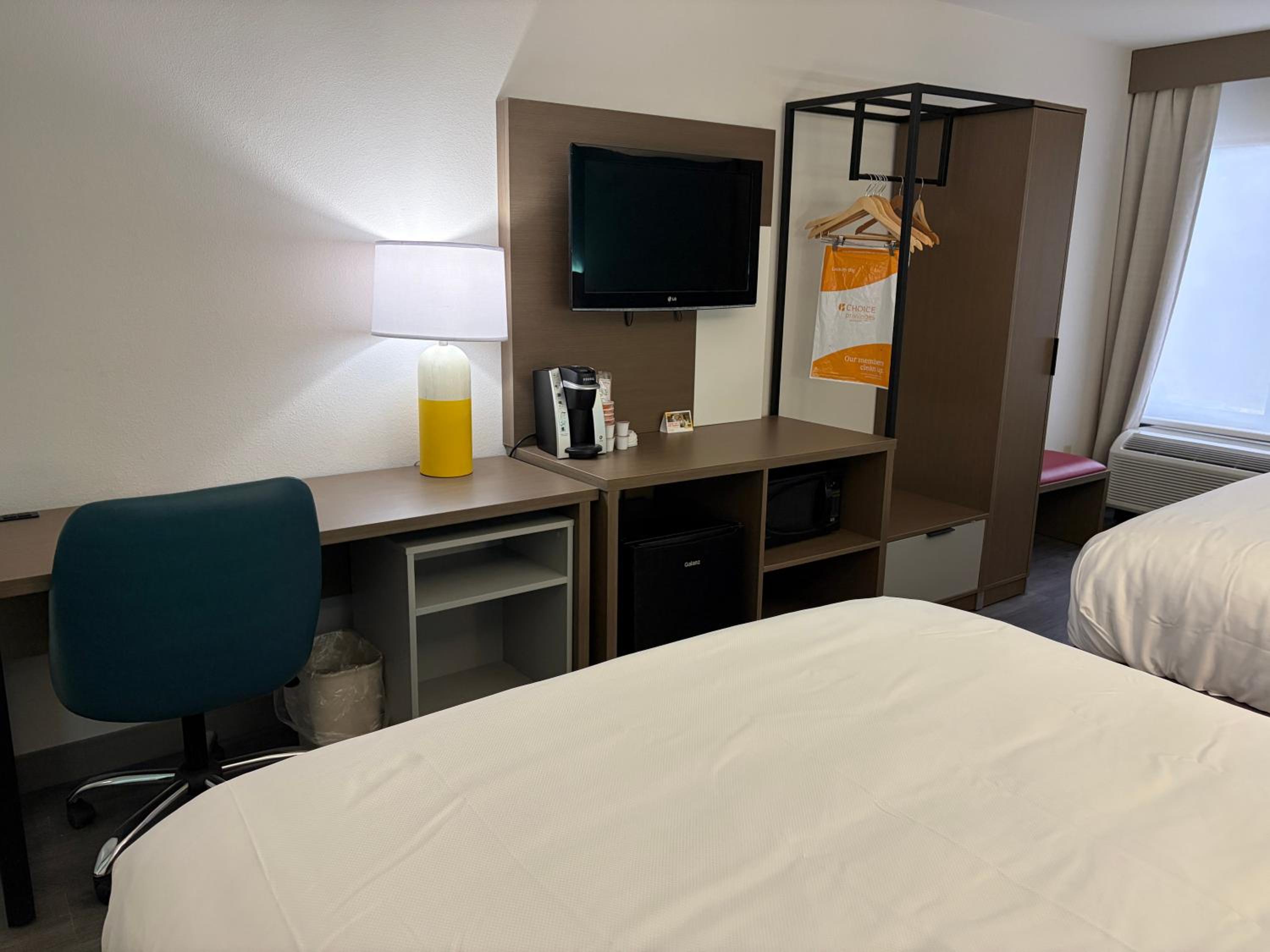 Quadruple Room with Two Queen Beds - Non Smoking/Interior Hall/Pet Friendly photo 2