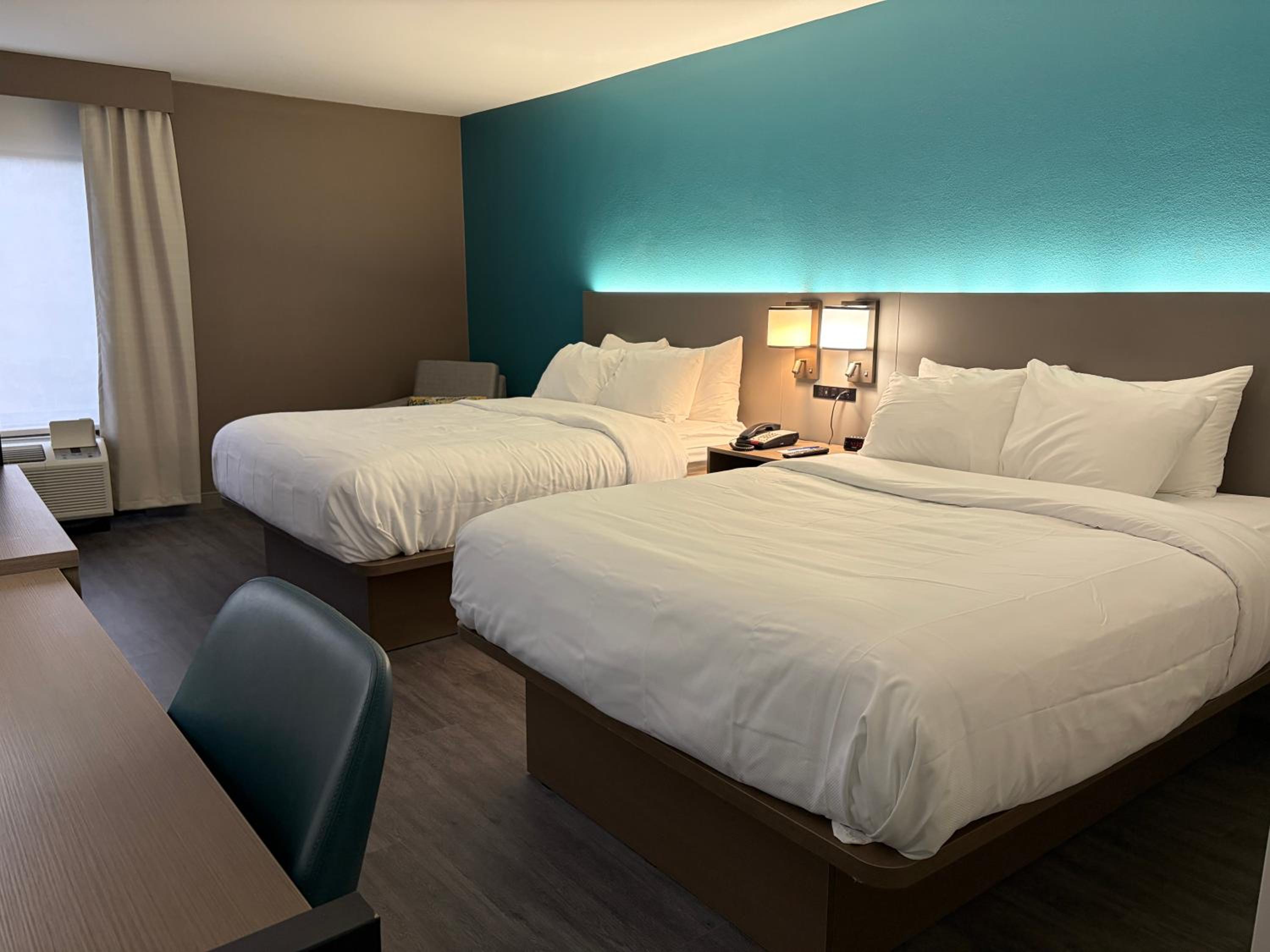Quadruple Room with Two Queen Beds - Non Smoking/Interior Hall/Pet Friendly photo 1