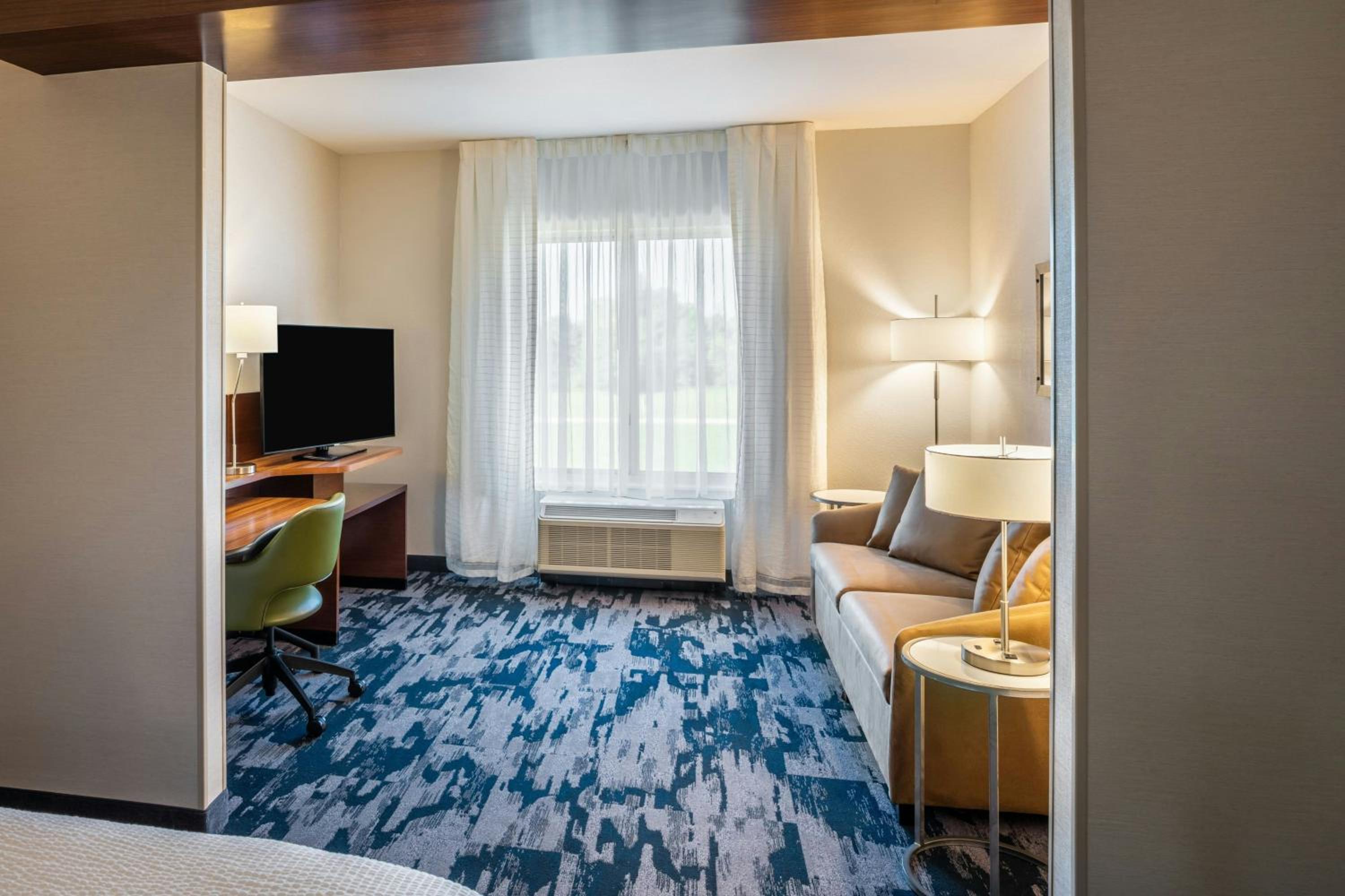 Queen Suite with Two Queen Beds and Sofa Bed