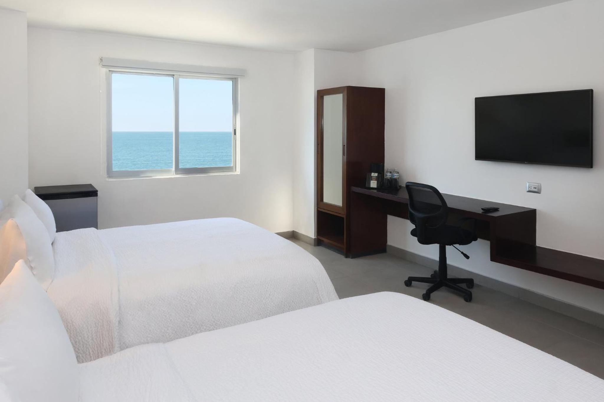 Two-Bedroom Suite with Four Queen Beds and Ocean Front