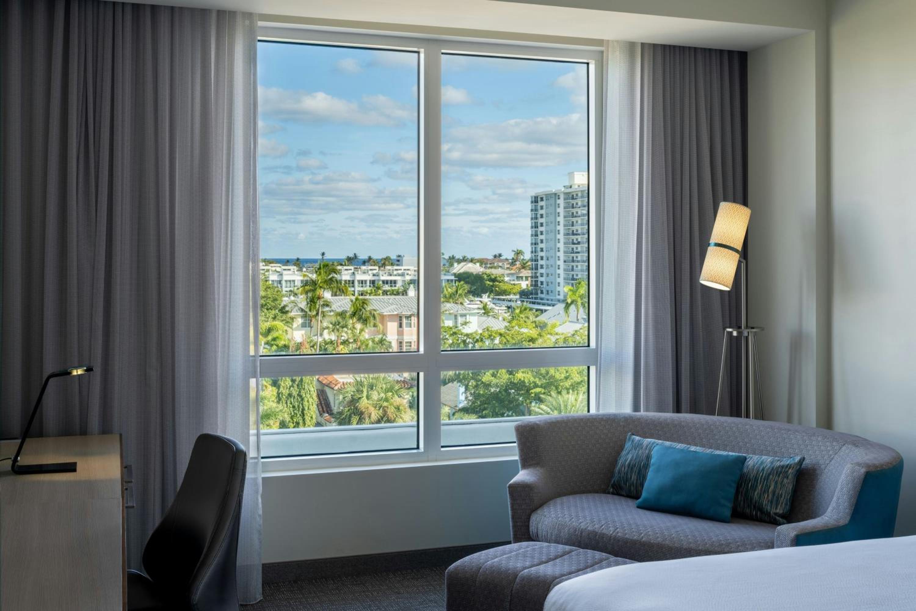 Queen Room with Two Queen Beds and Coastal View - Photo 1