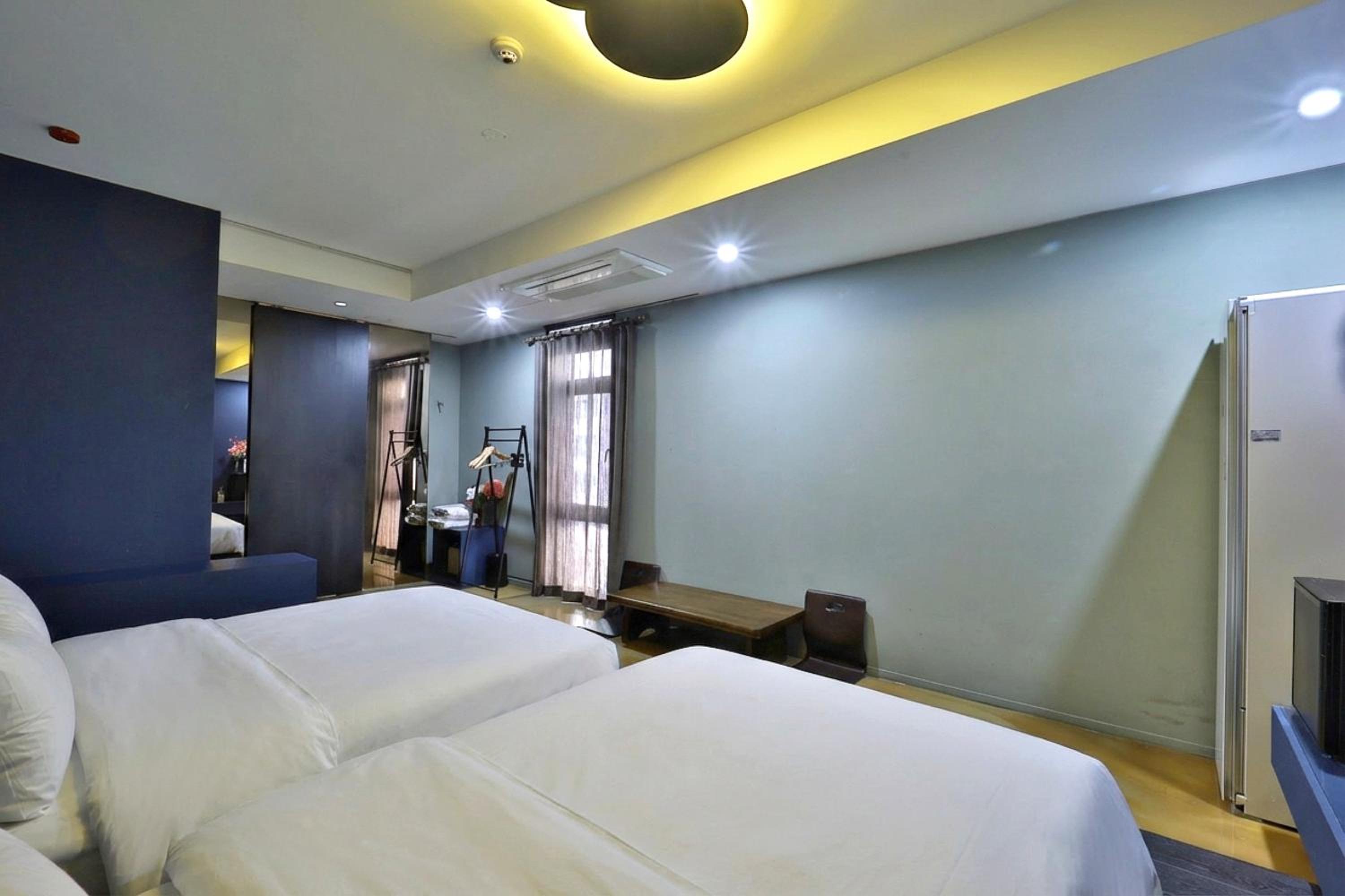 Deluxe Triple Room - Photo 11