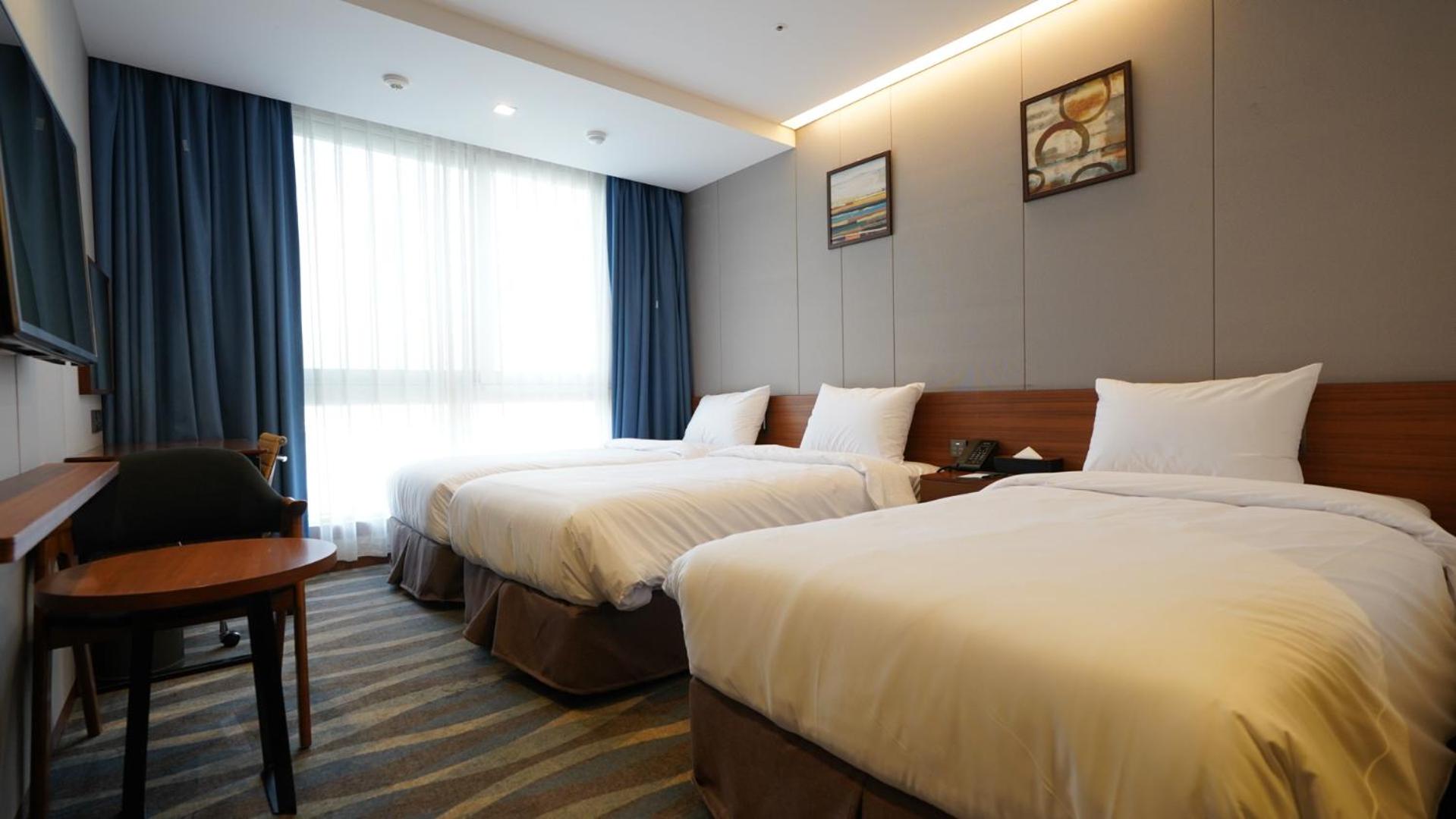 Triple Room - Photo 1