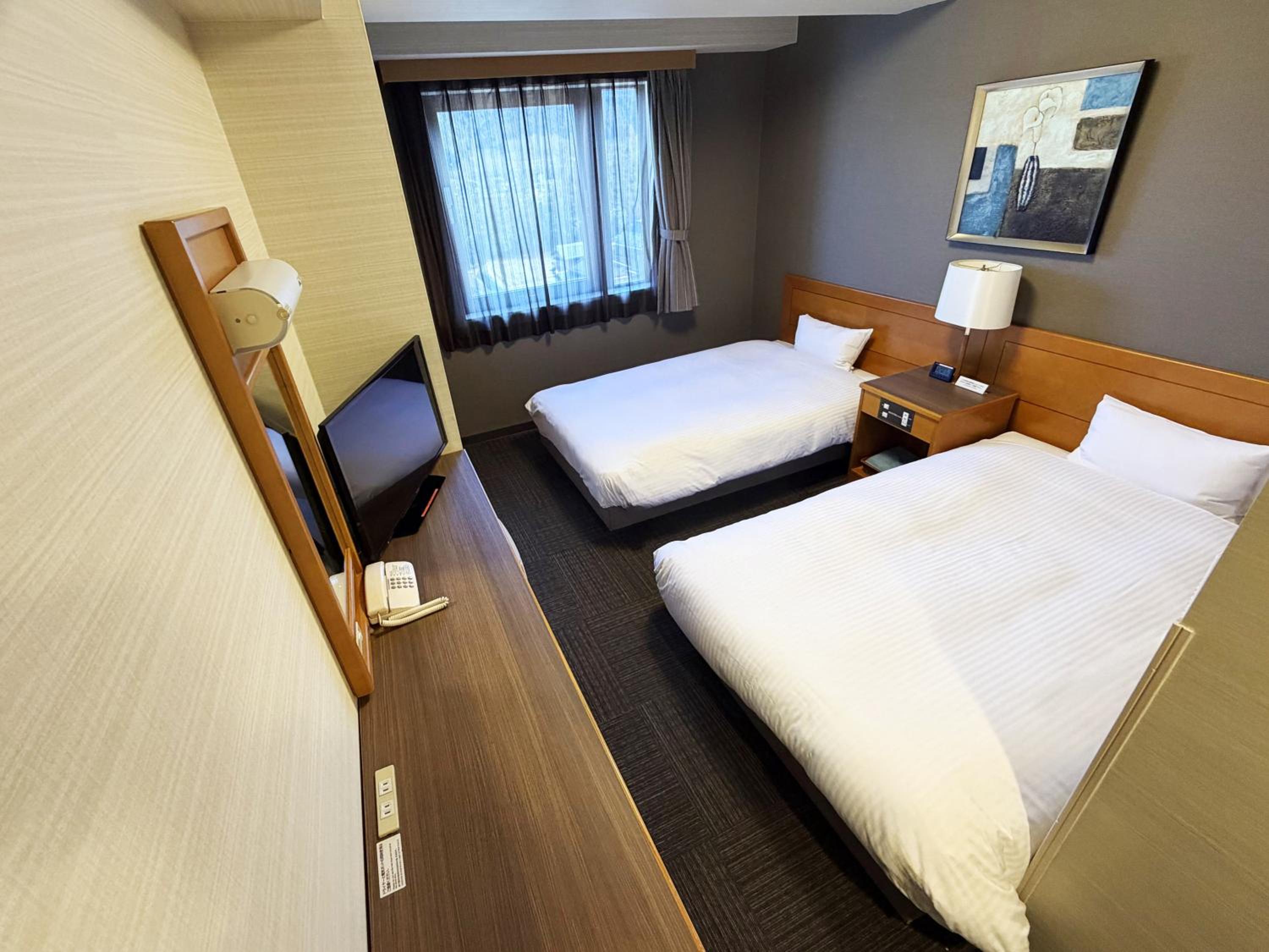 Twin Room - Non-Smoking - No Daily Cleaning - Photo 2