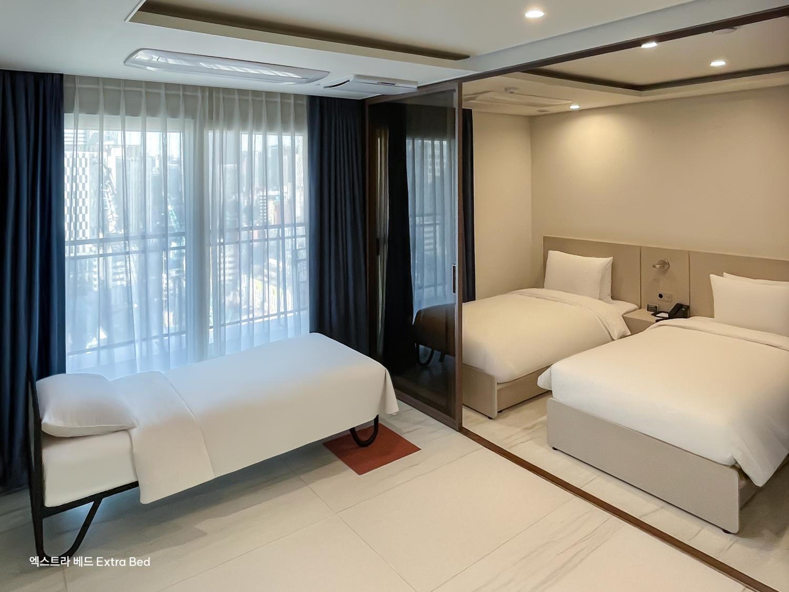 Premier Suite Triple - Photo 1