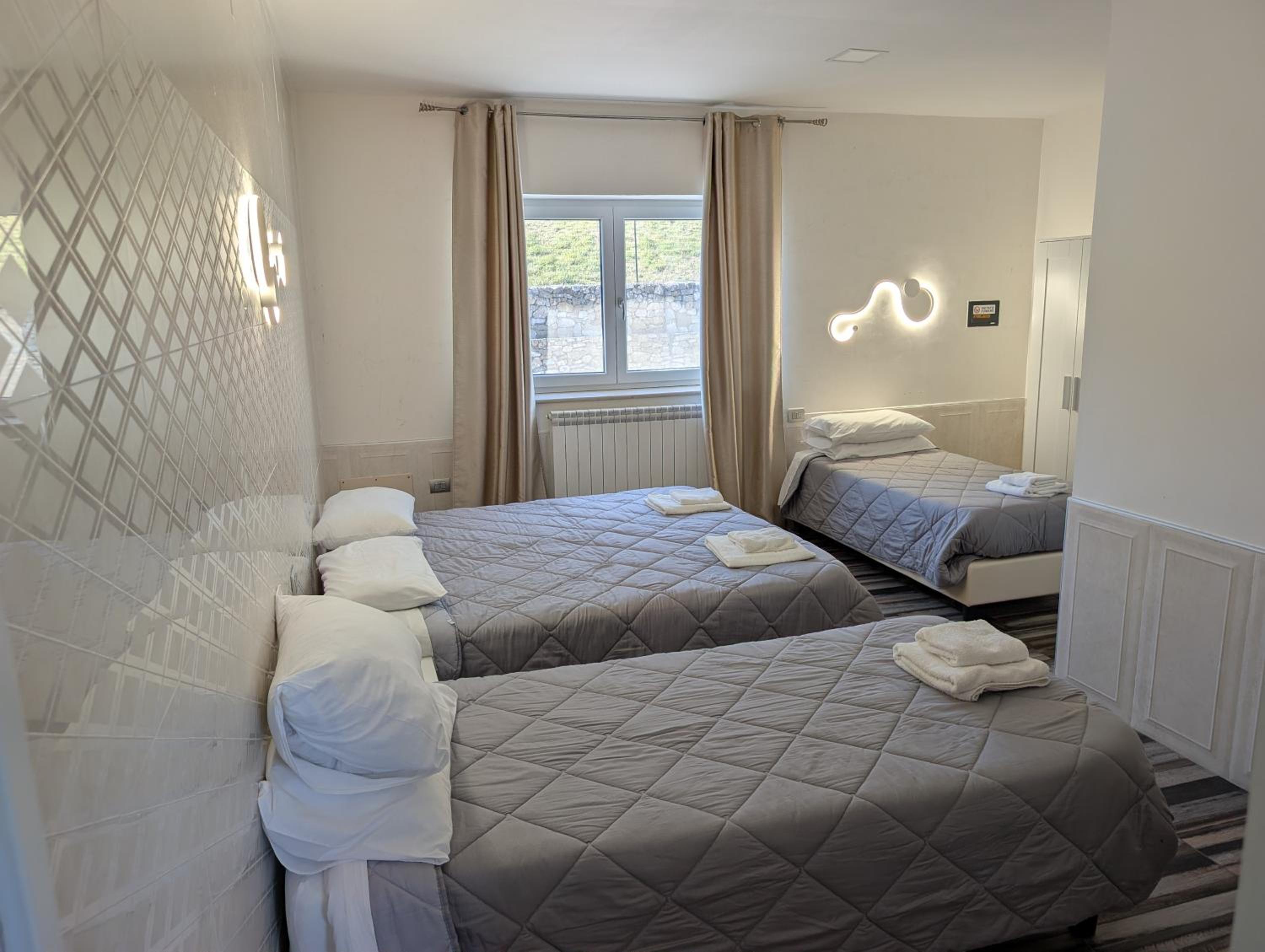 Deluxe Quadruple Room