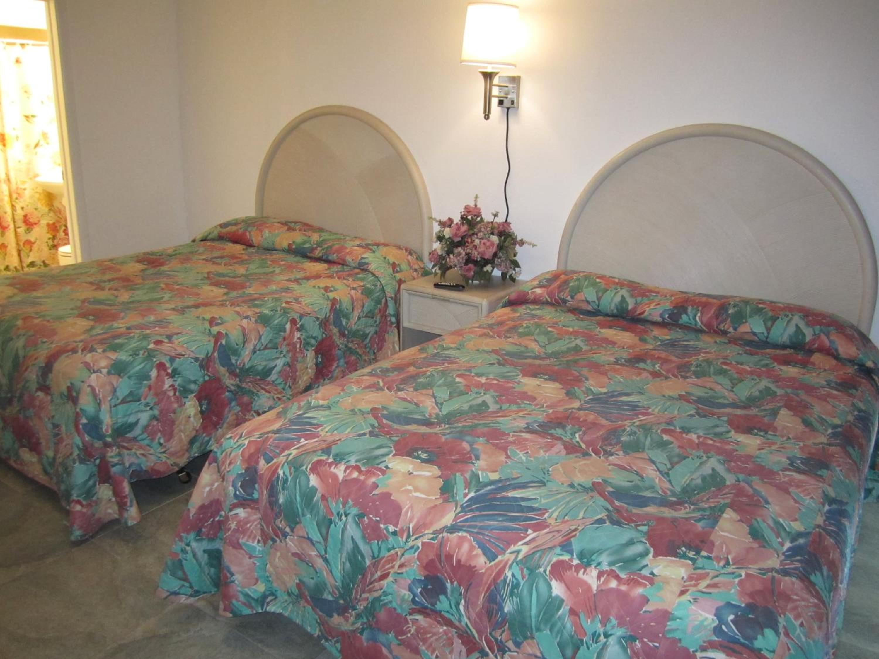 Room with Two Queen Beds and Side Ocean View and Kitchenette photo 1