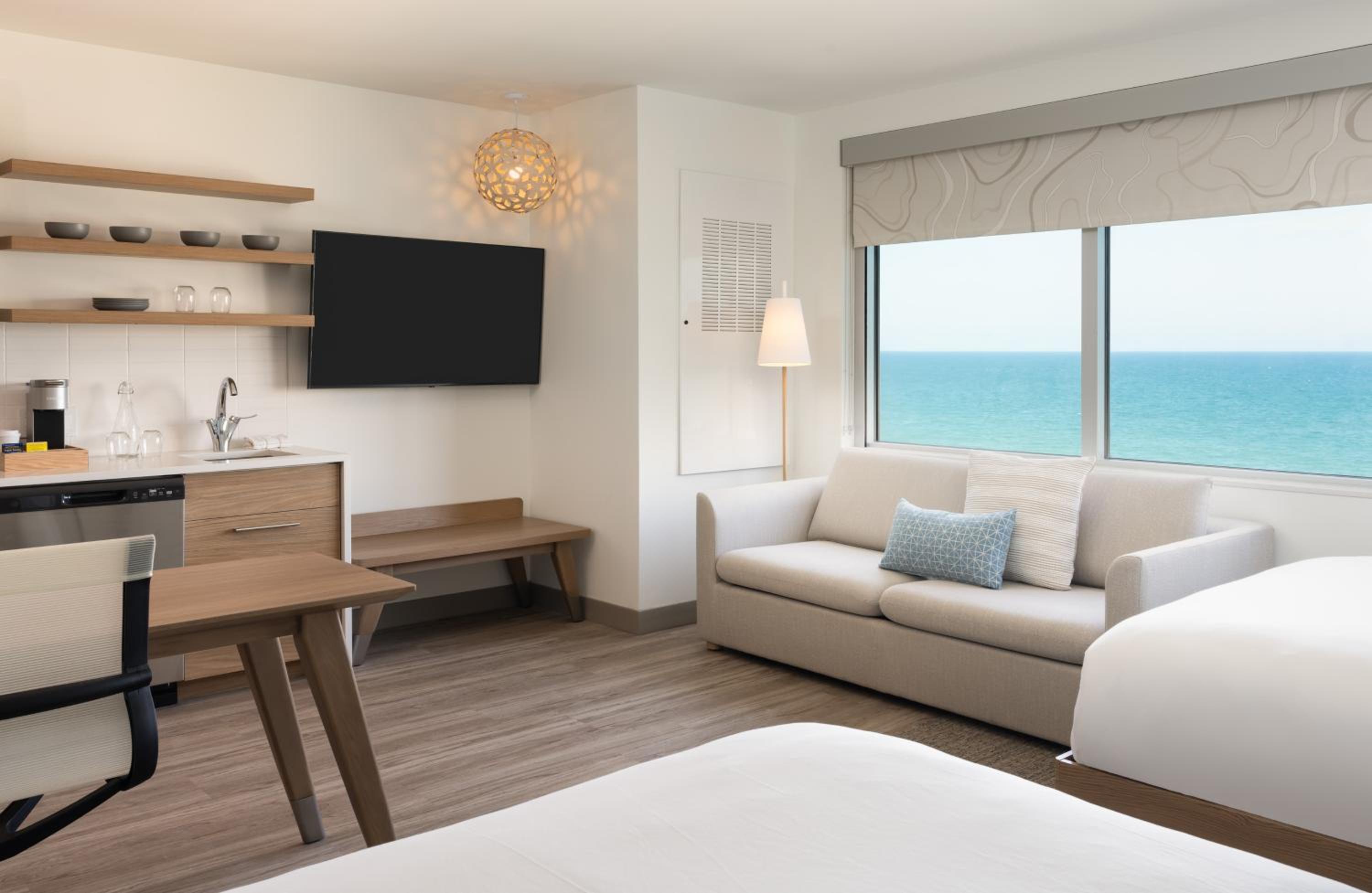 Studio Queen Room with Ocean View and Sofa Bed - Mobility Accessible with Roll-in Shower
