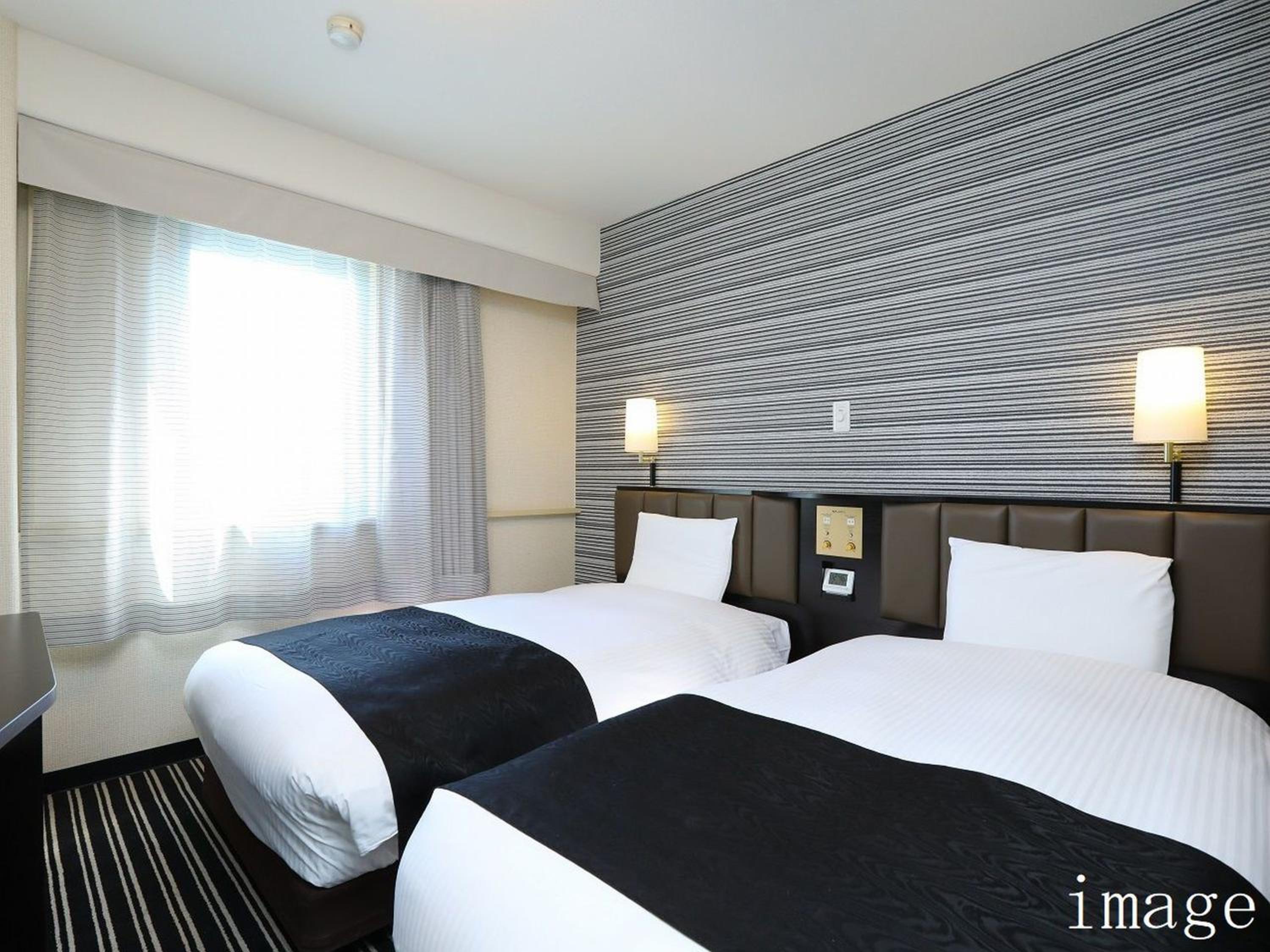 Twin Room - Non-Smoking photo 1