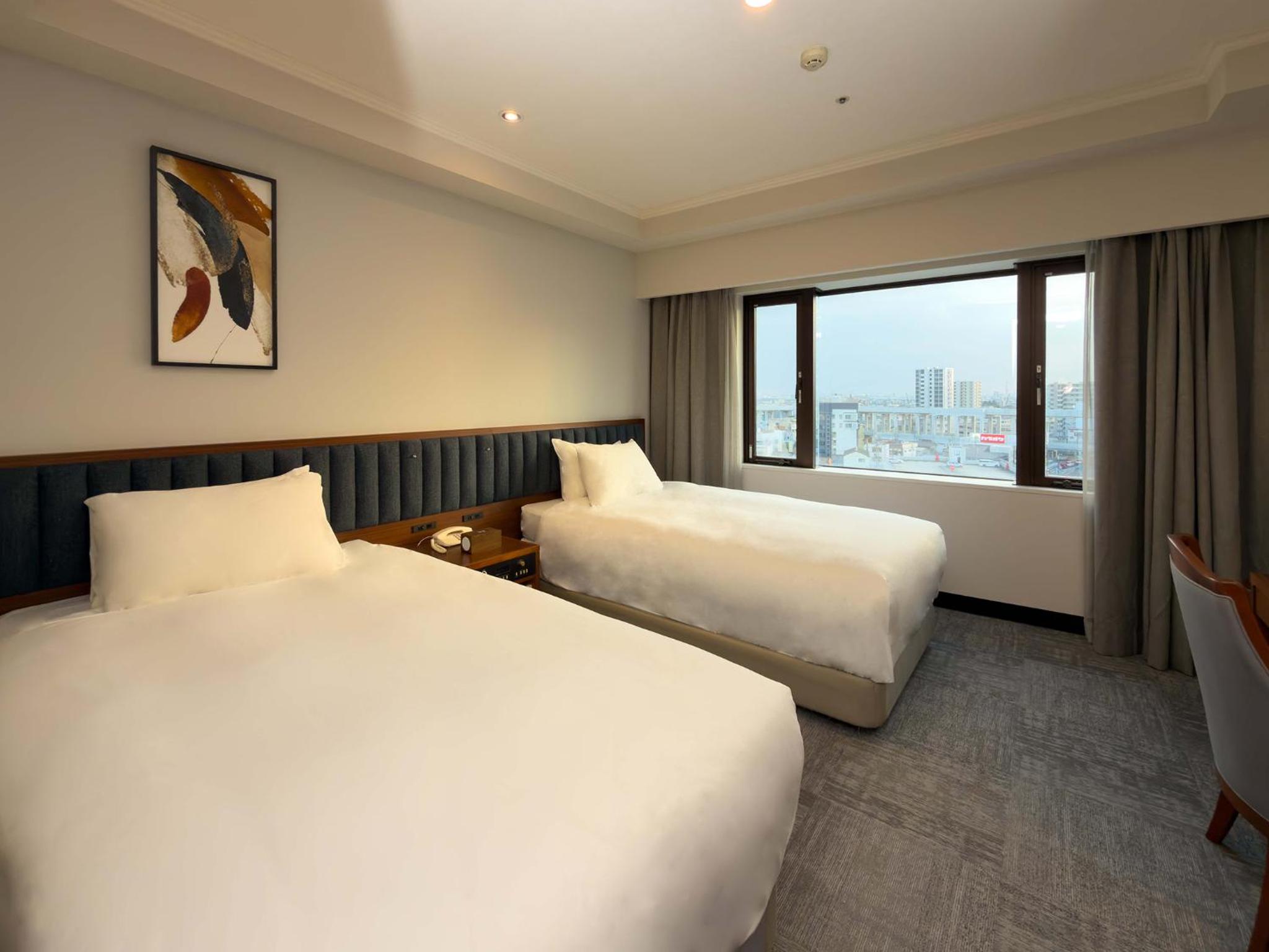 Standard Twin Room - Photo 2