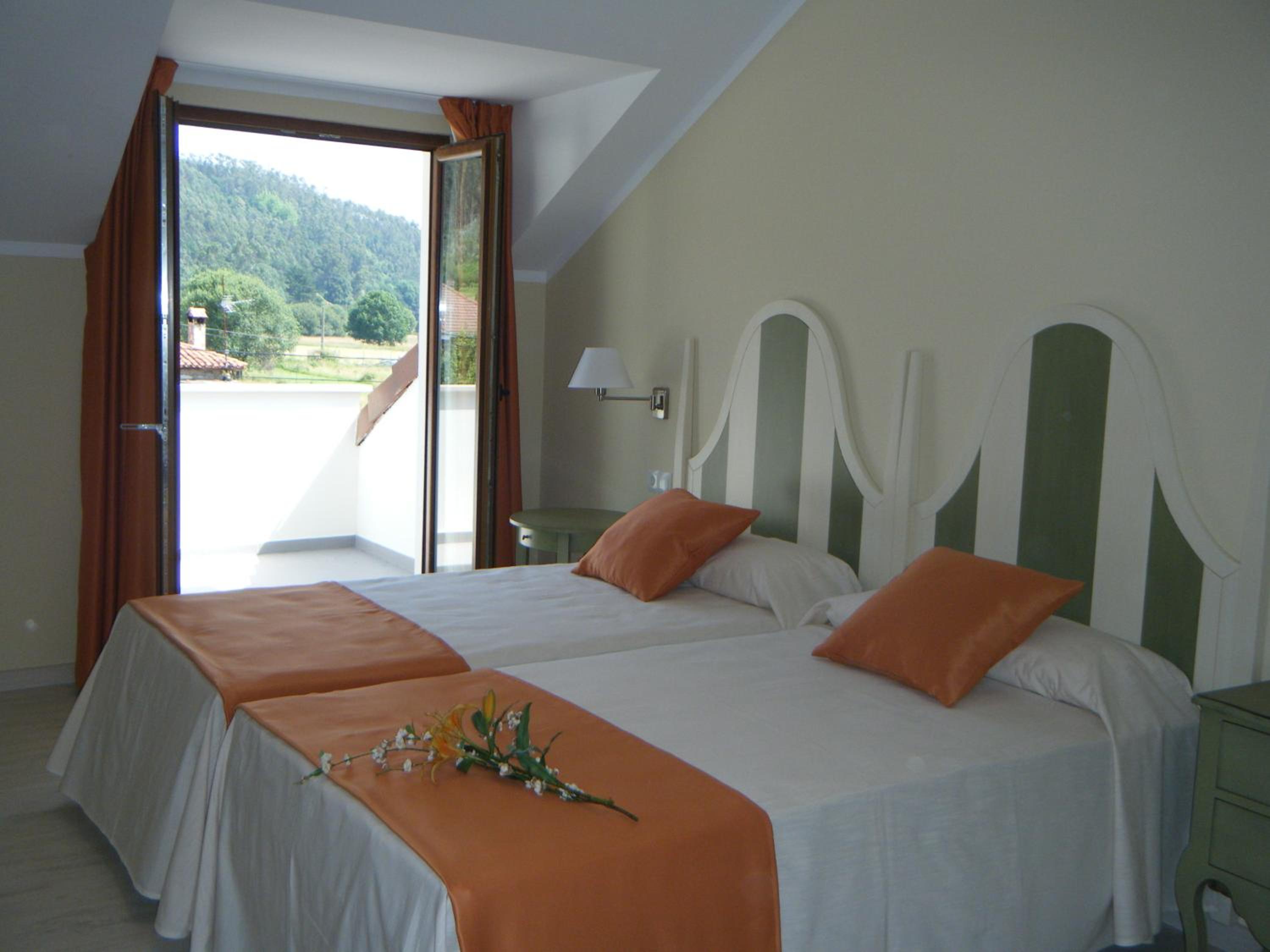 Habitación Cuádruple Básica (2 Adultos + 2 Niños)