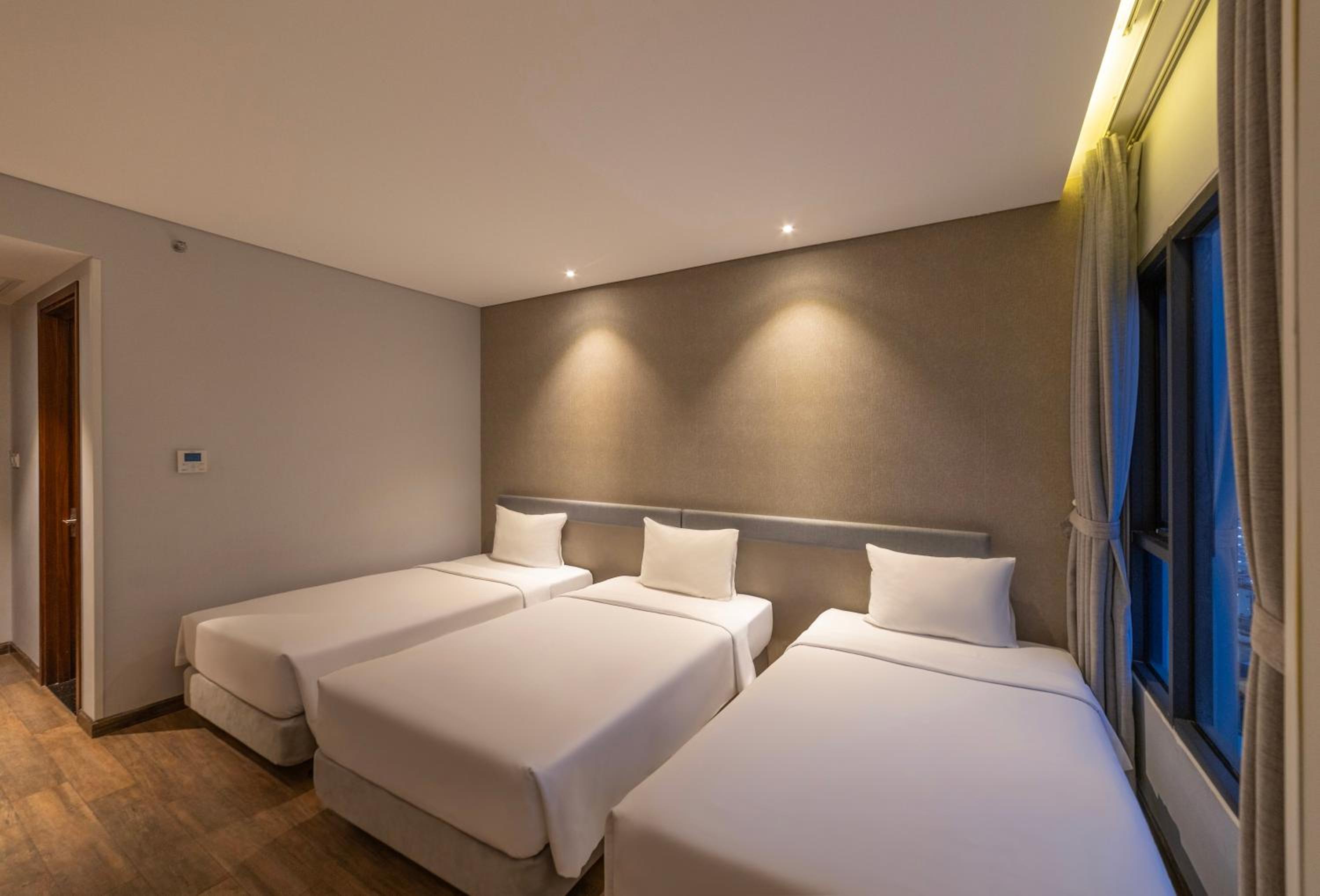Deluxe Triple Room - Photo 5