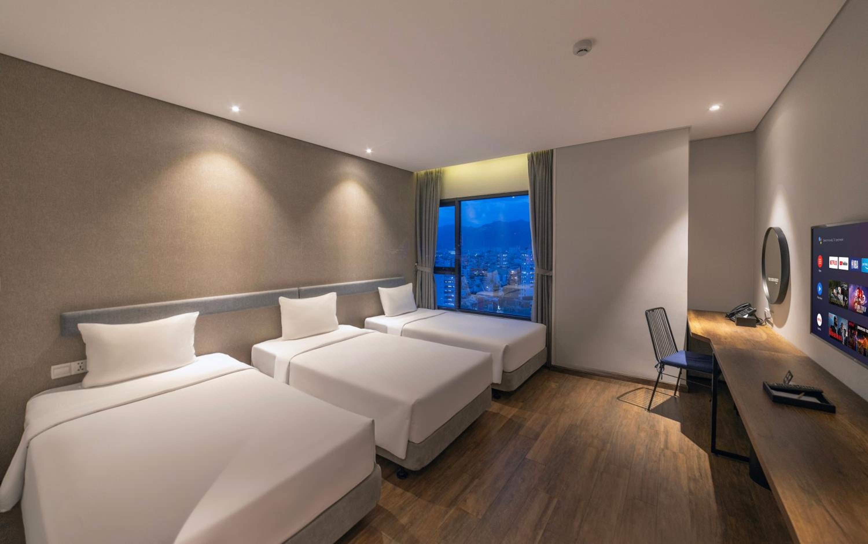Deluxe Triple Room - Photo 2