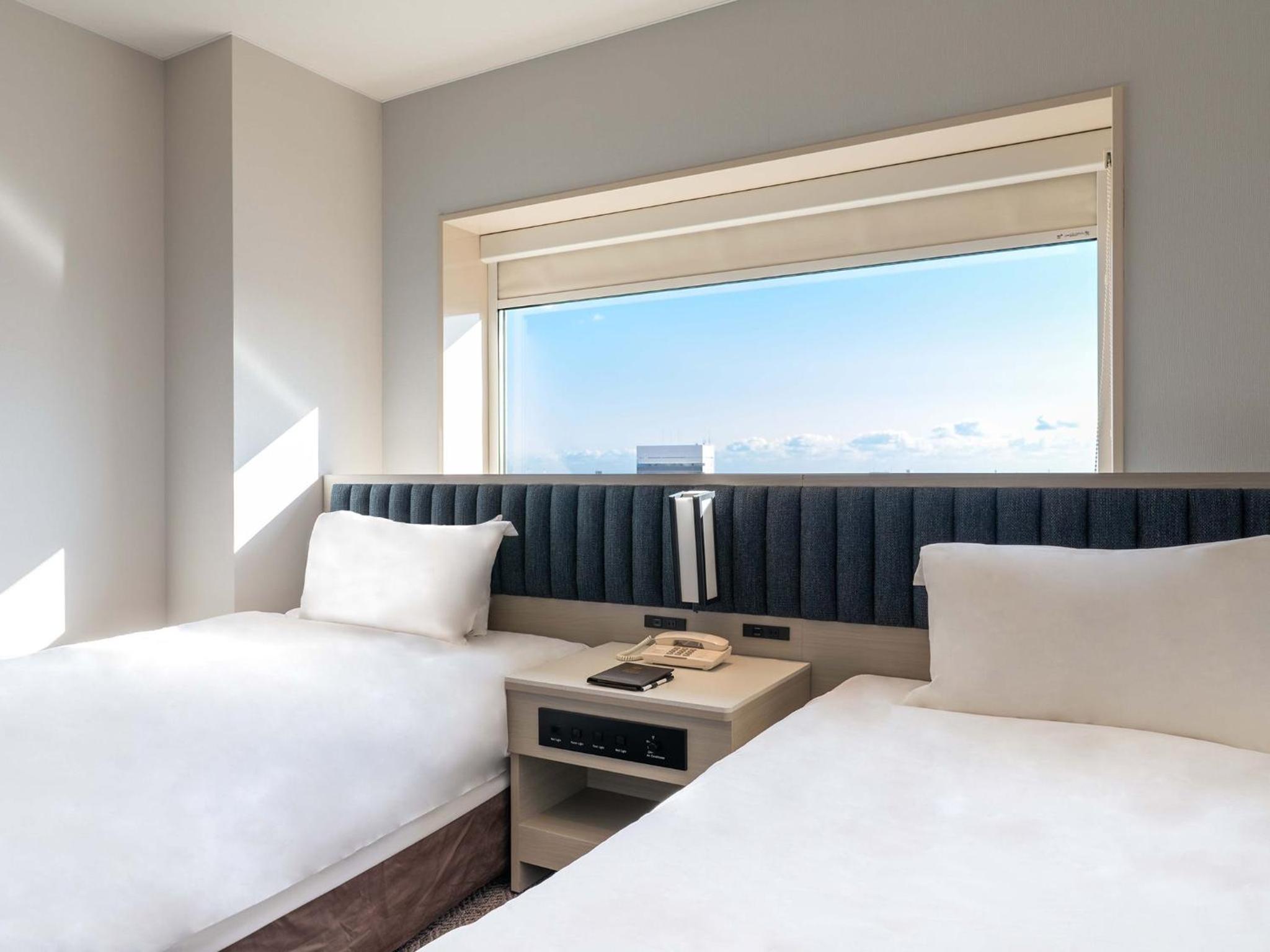 Standard Twin Room - Photo 4