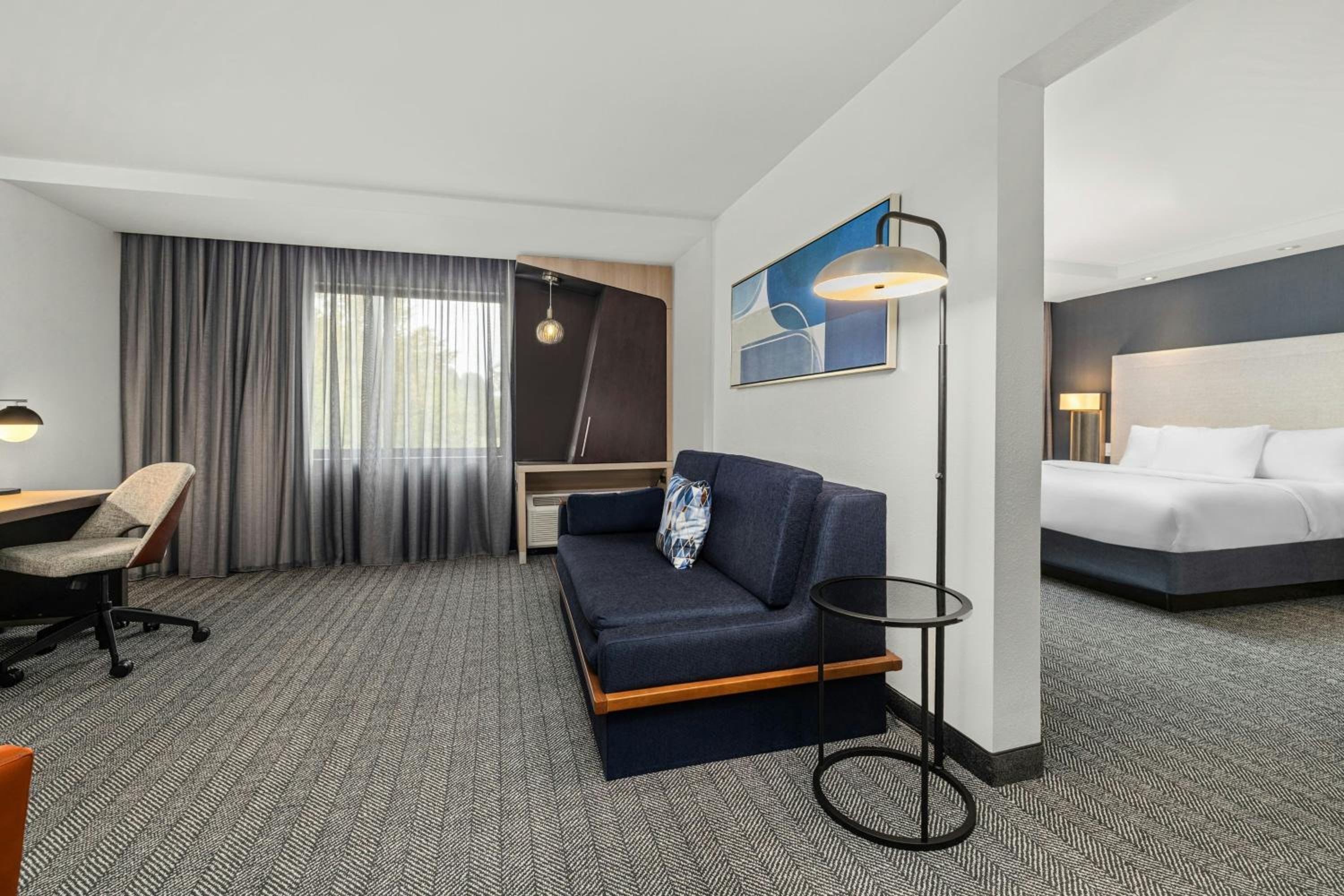 One-Bedroom King Suite with Roll-In Shower and Sofa Bed - Mobility Access/Hearing Accessible photo 2