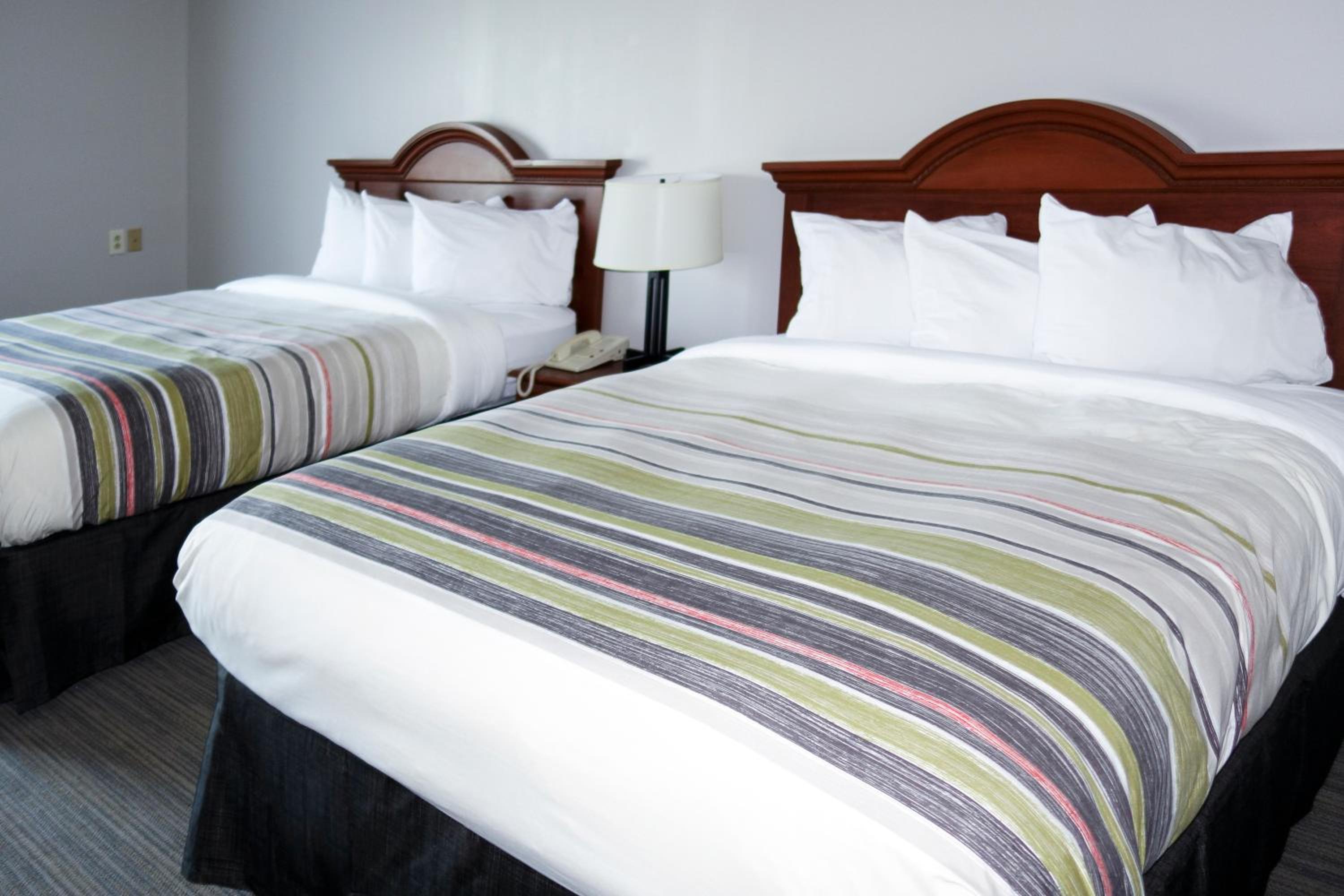 Queen Room with Two Queen Beds - Photo 1