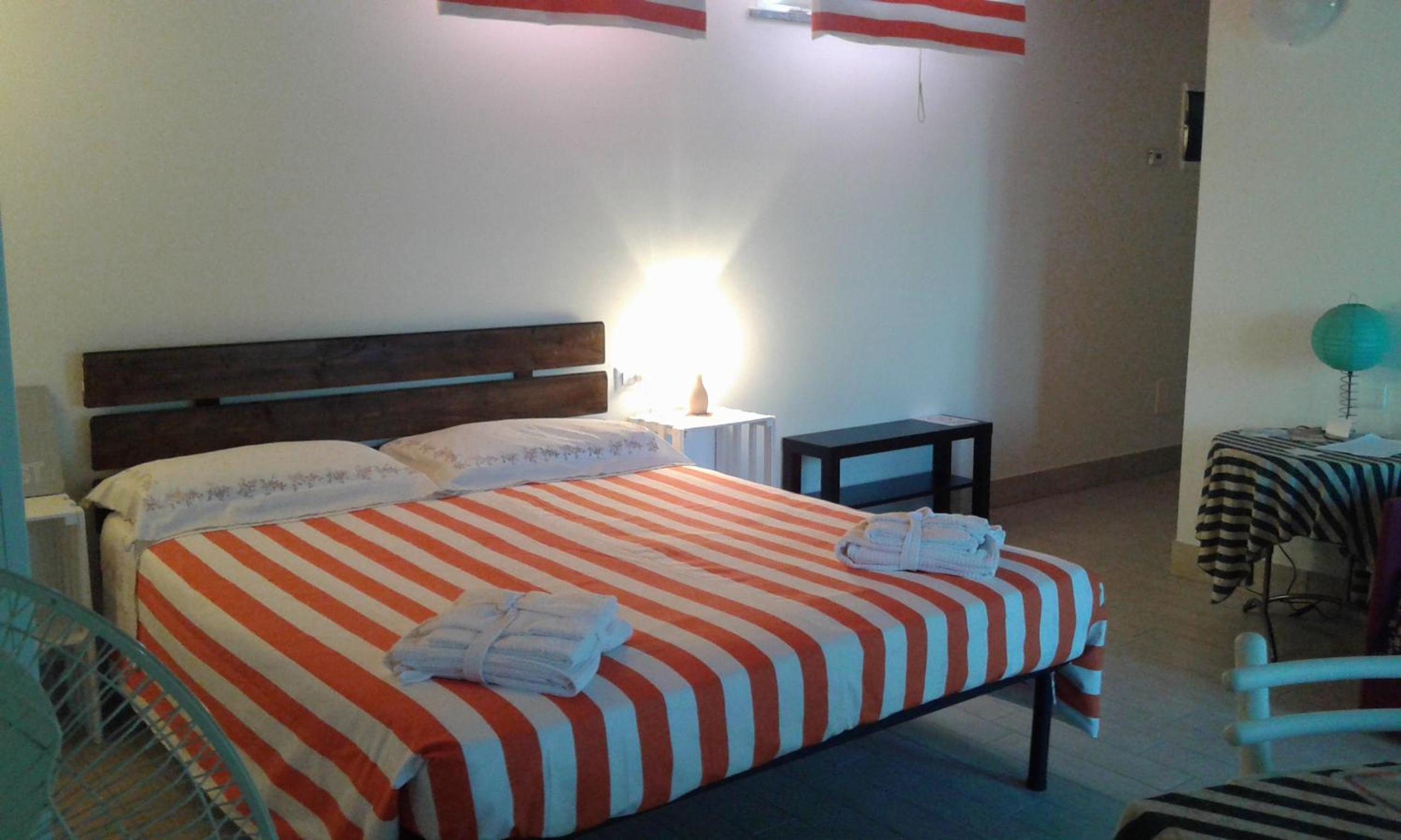 Quadruple Room with Balcony - Photo 11