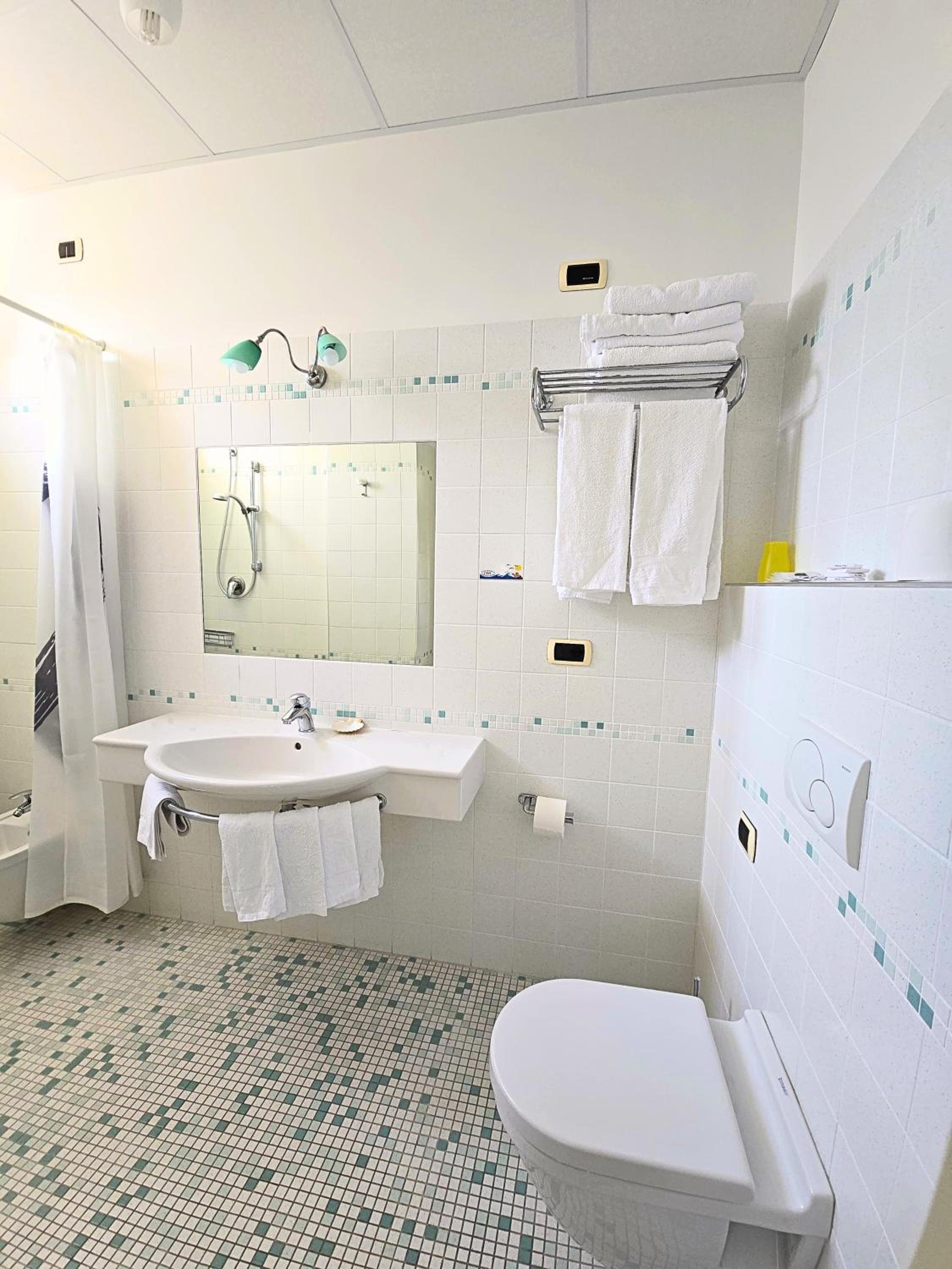Quadruple Room with Balcony