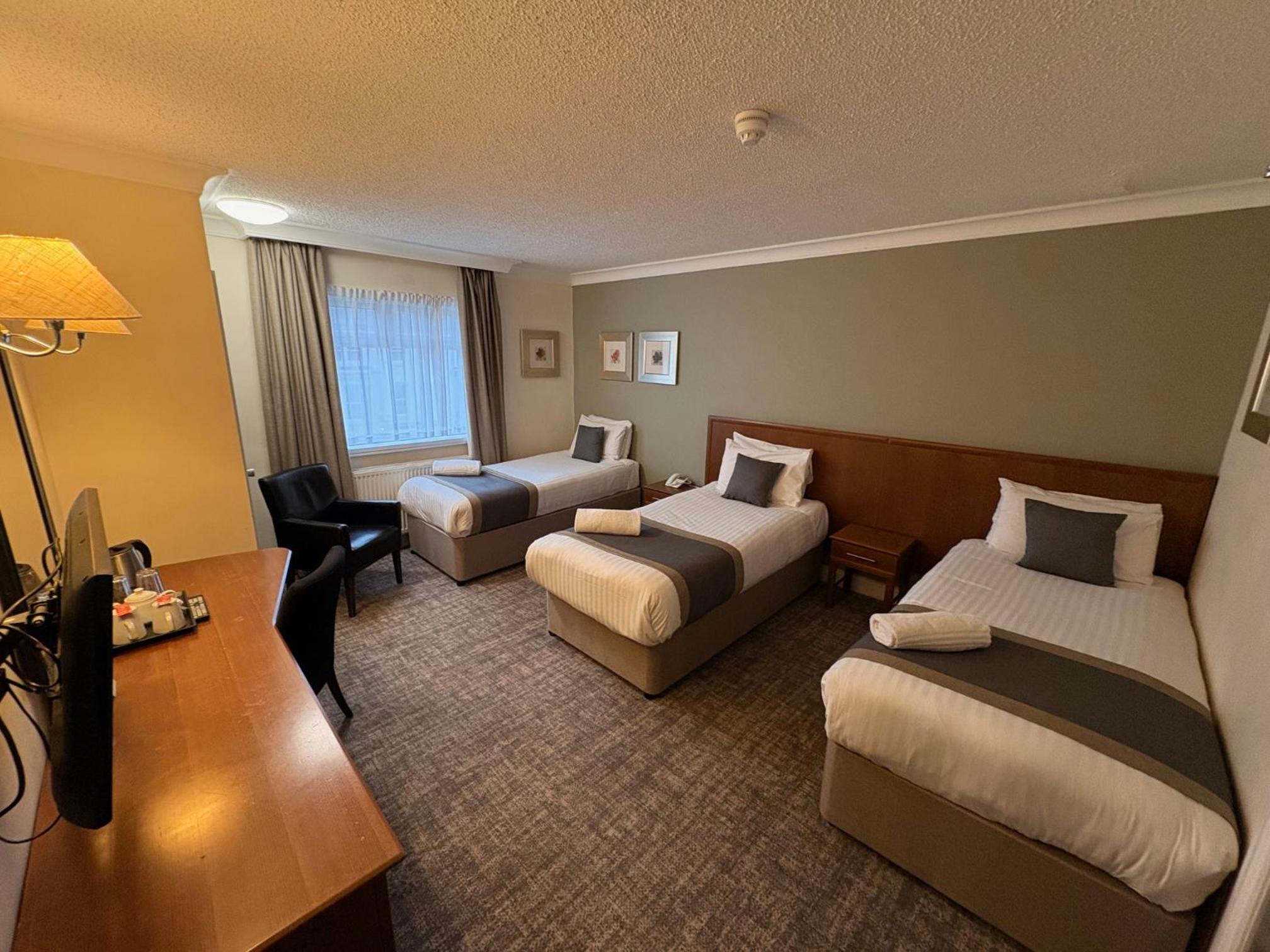 Triple Room - Photo 1
