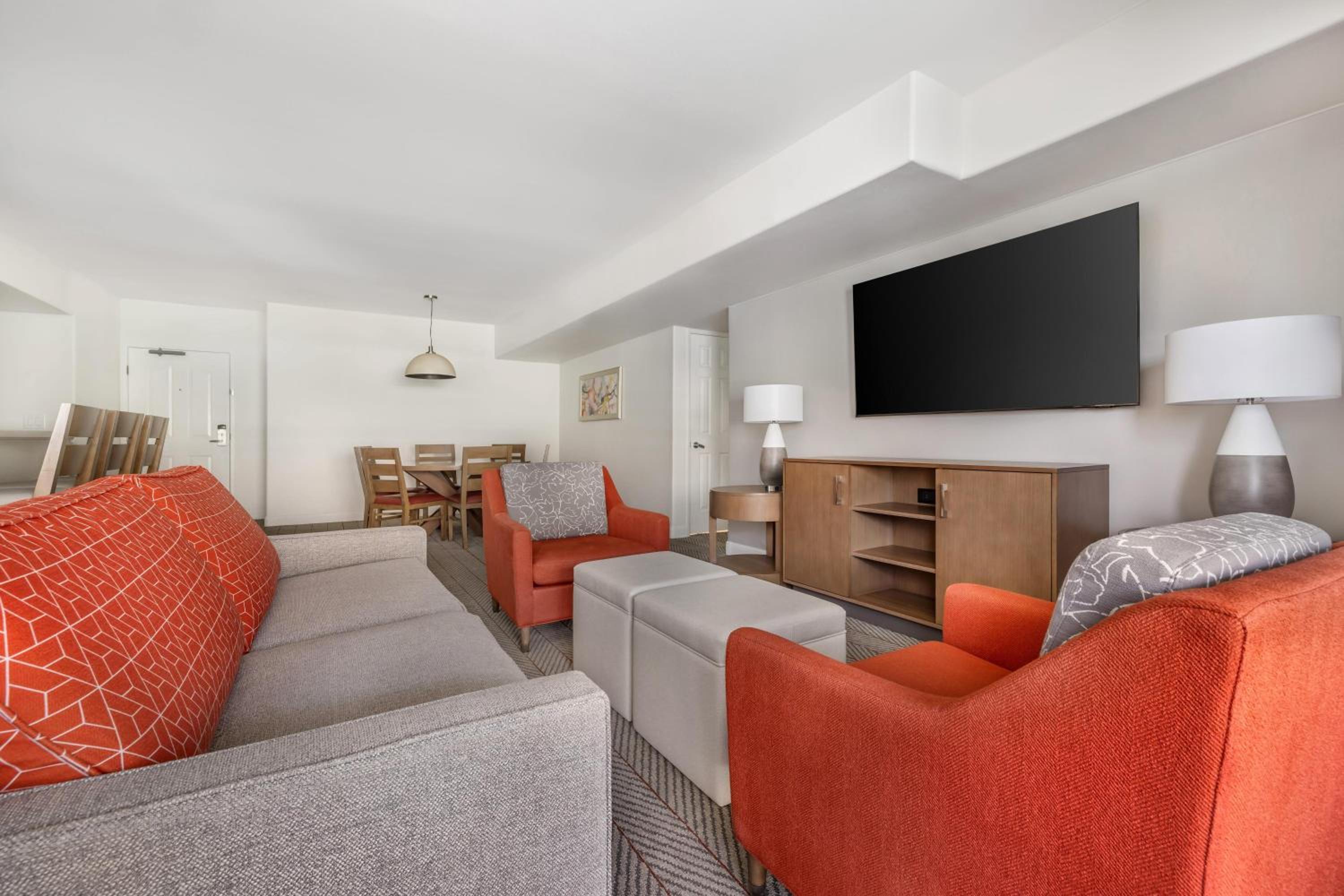 Two-Bedroom Suite with One King Bed, One Queen Bed, and Roll-In Shower