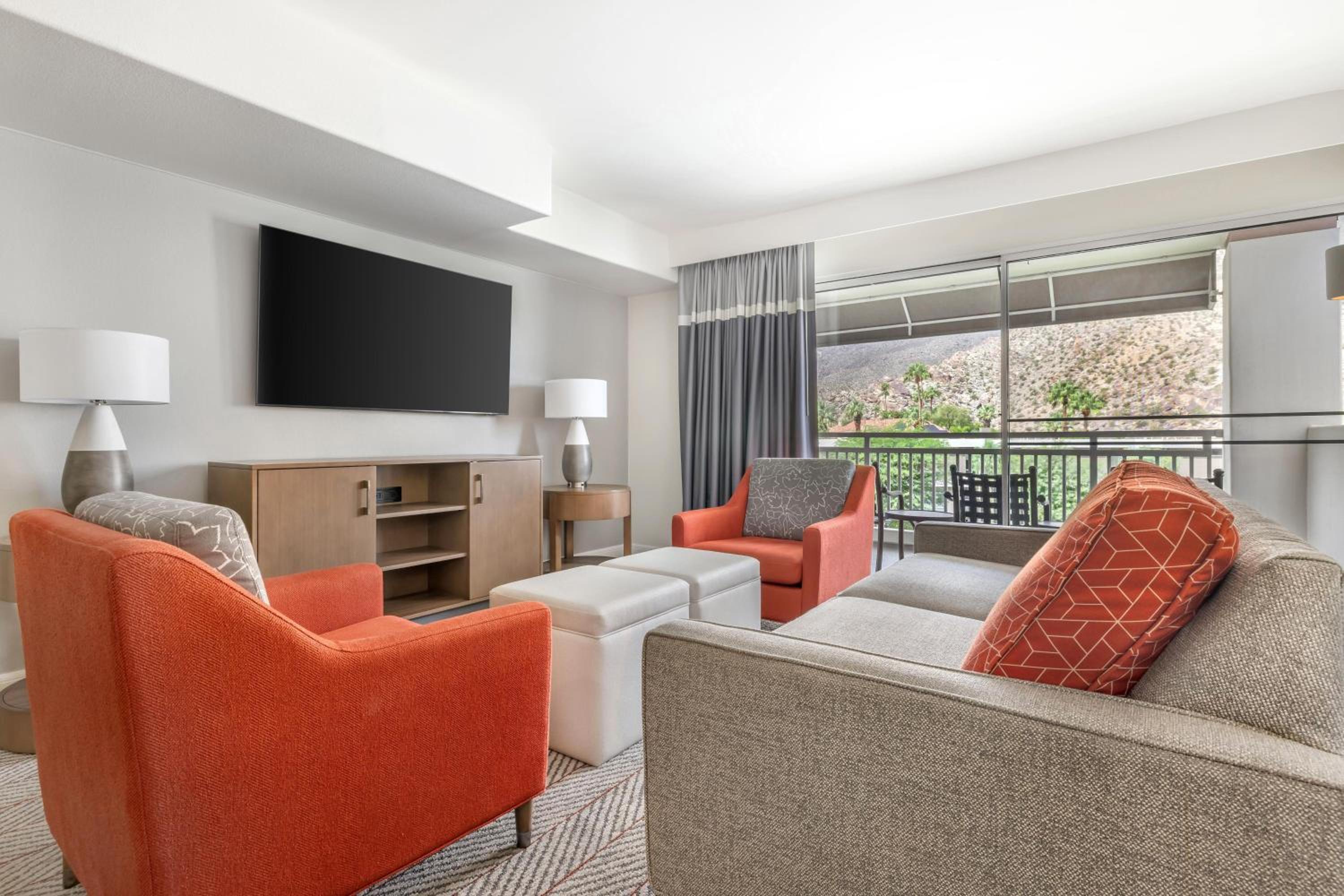 Two-Bedroom Suite with One King Bed, One Queen Bed, and Roll-In Shower
