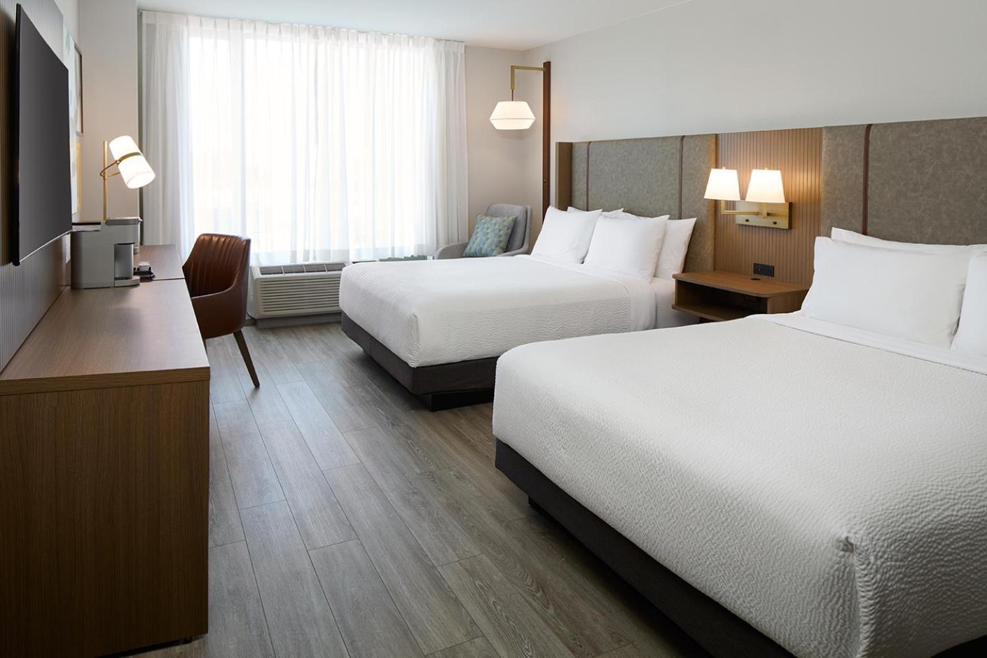 Queen Suite with Two Queen Beds and Sofa Bed