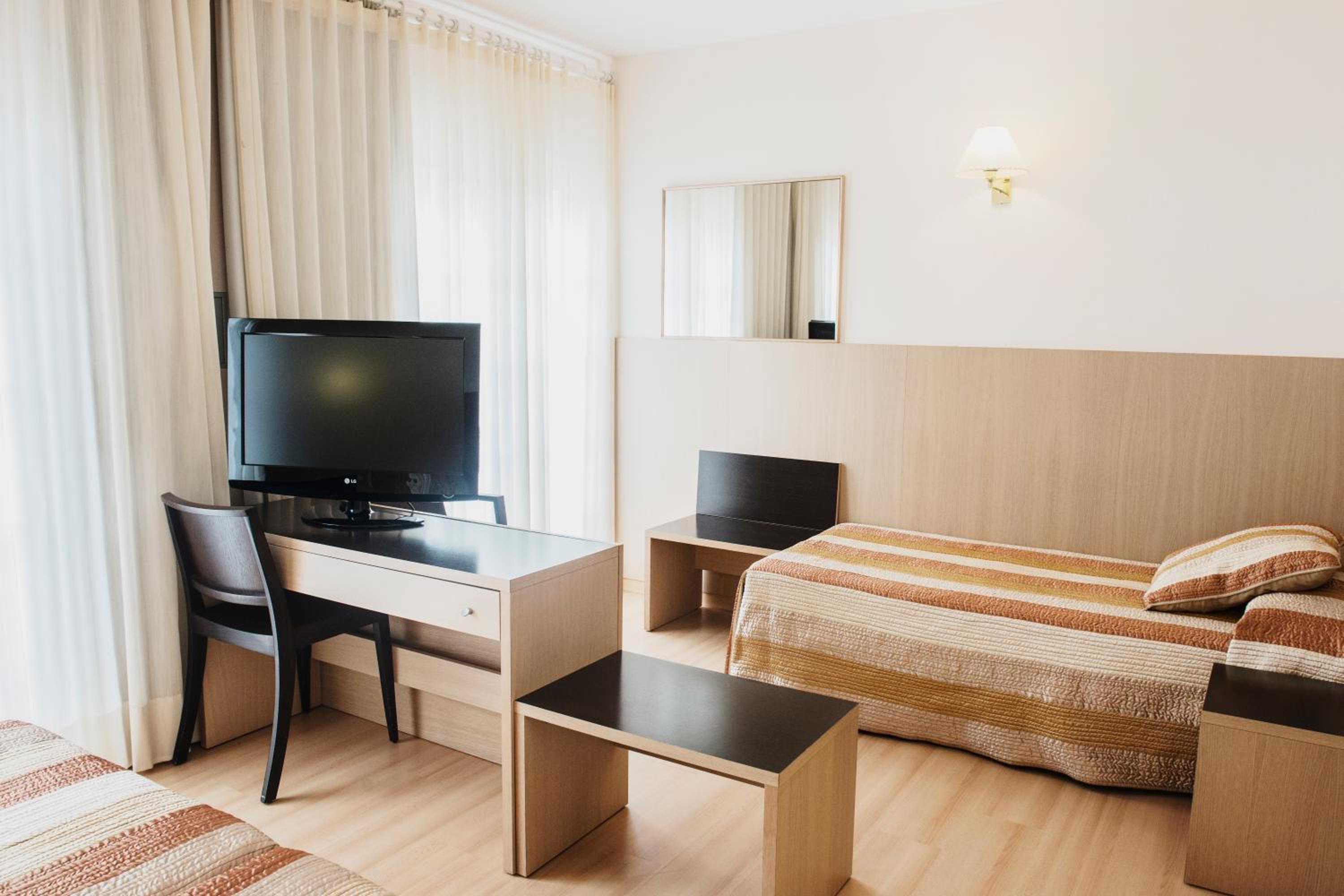Habitación triple (2 adultos + 1 niño)