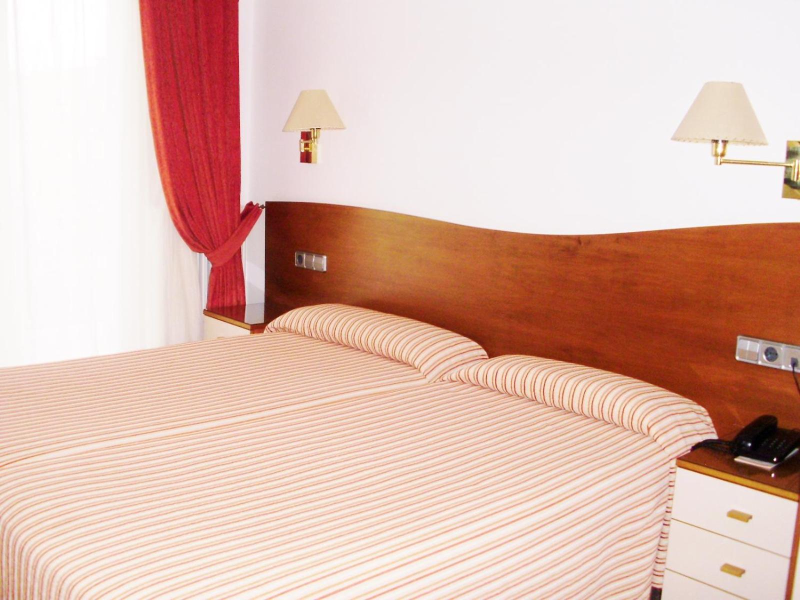 Habitación Familiar Conectada (2 Adultos + 2 Niños)