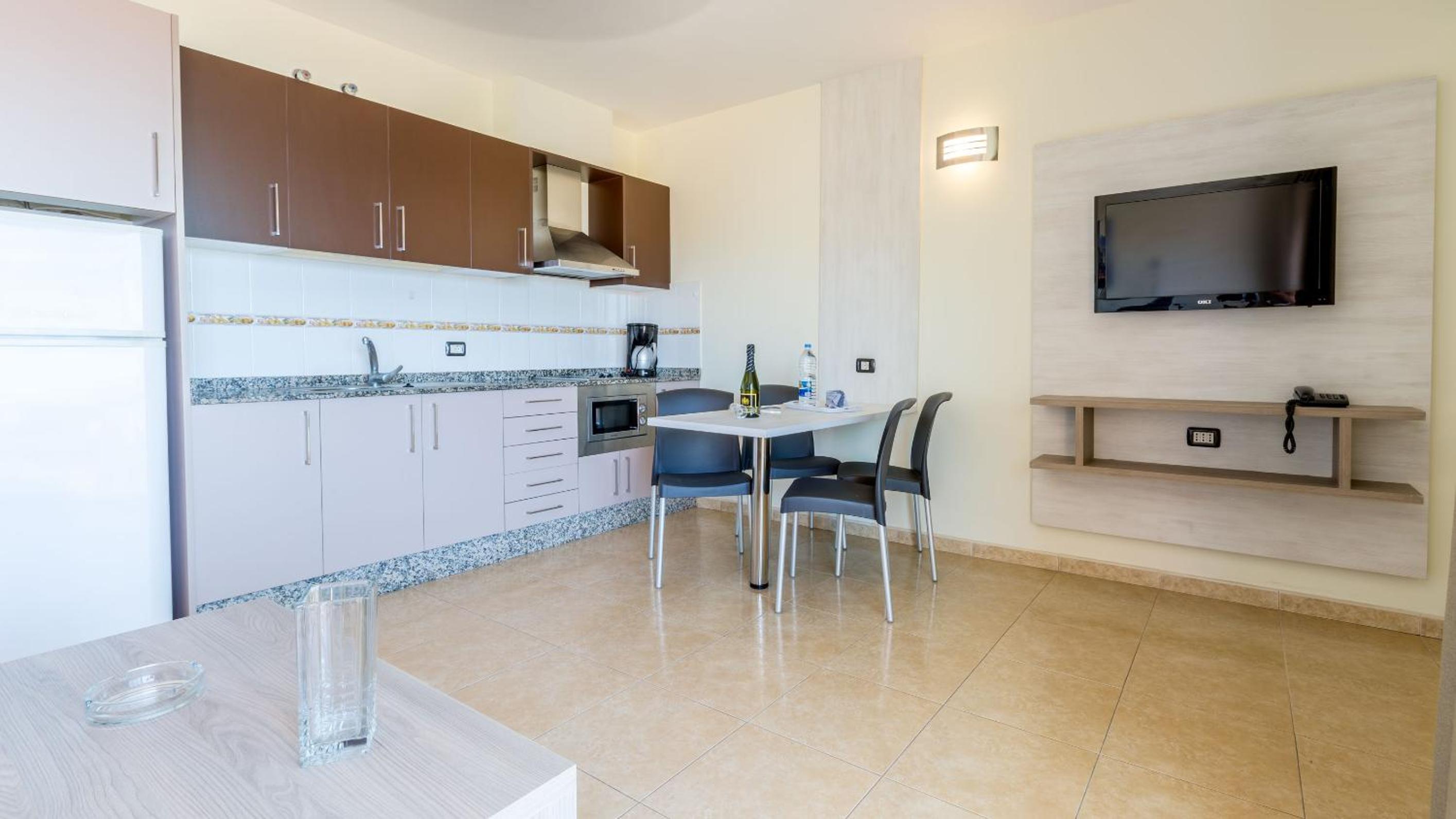 One-Bedroom Apartment with Terrace and Pool View