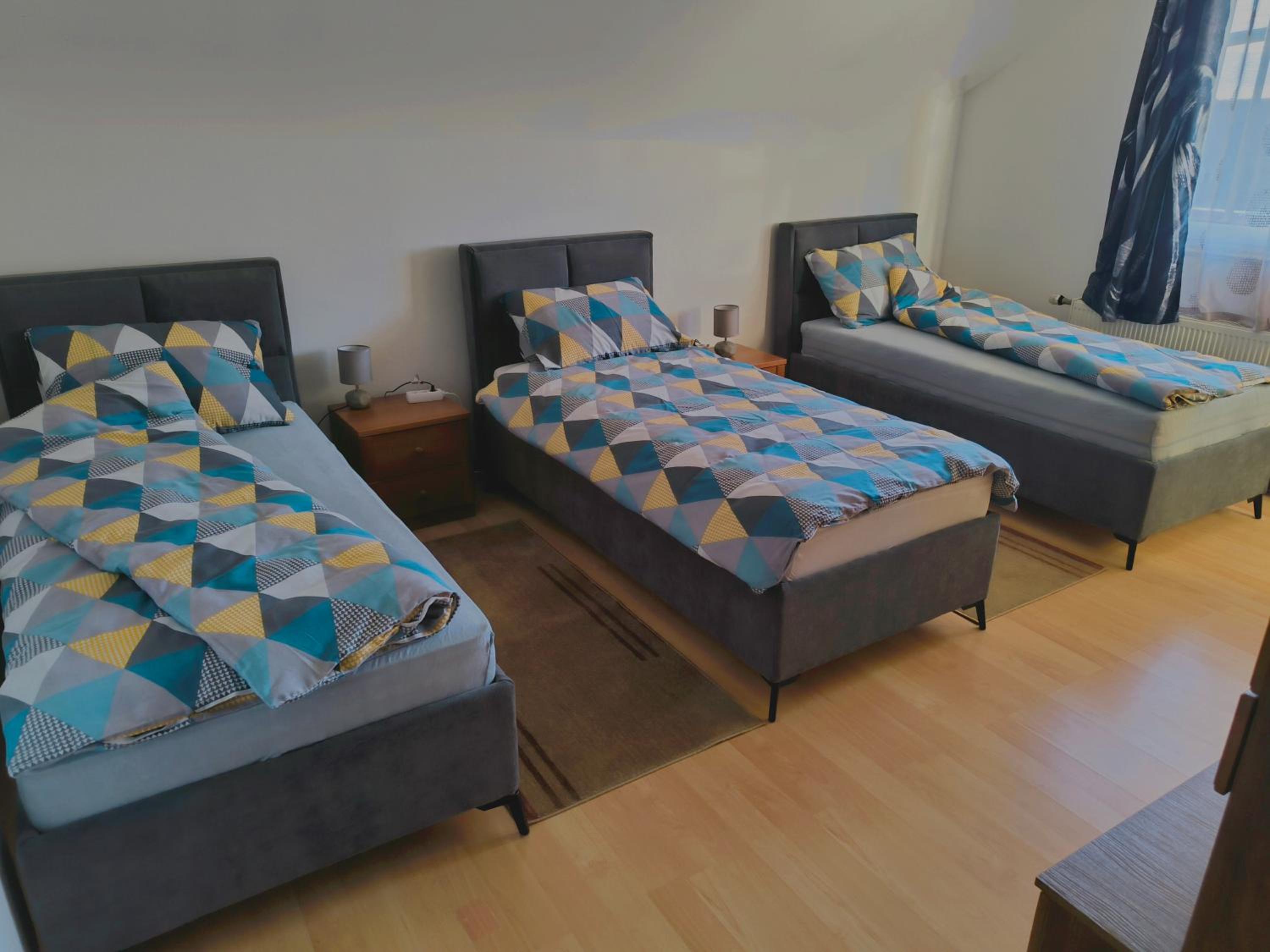 Three-Bedroom Apartment with Balcony photo 3