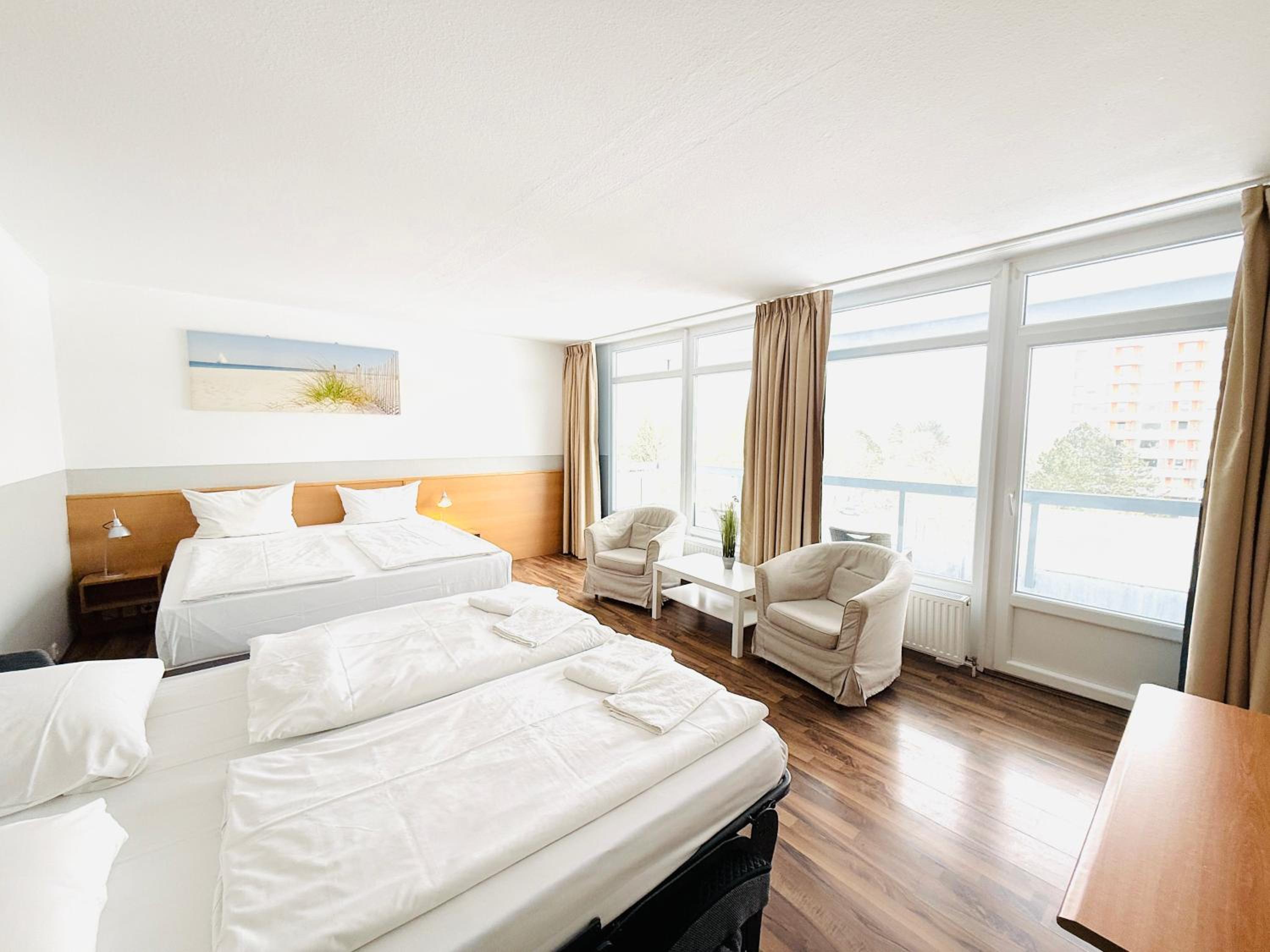 Family Room with One King Bed and One Sofa Bed - Photo 2