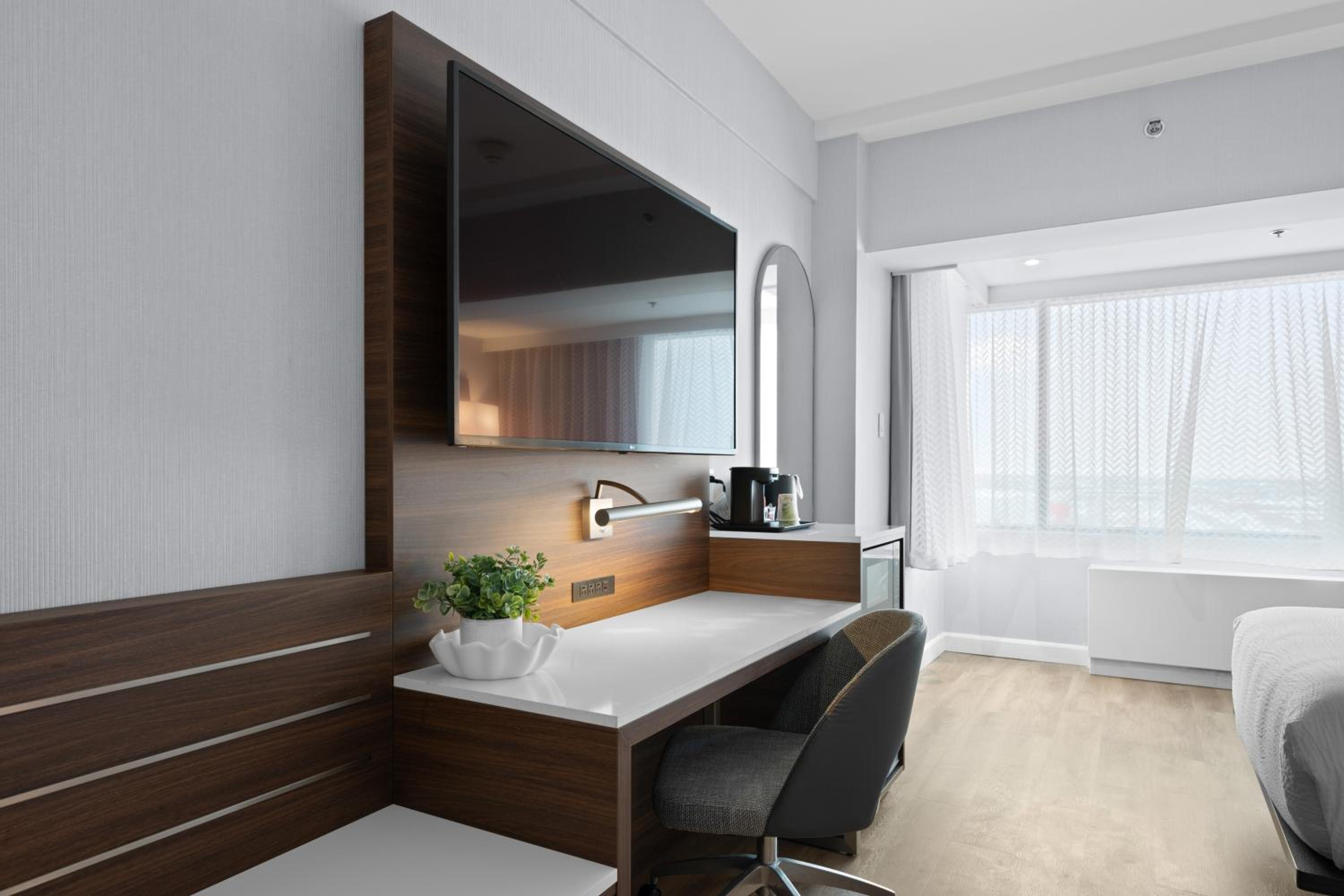 Standard Queen Room with Two Queen Beds and Bath Shower Combo