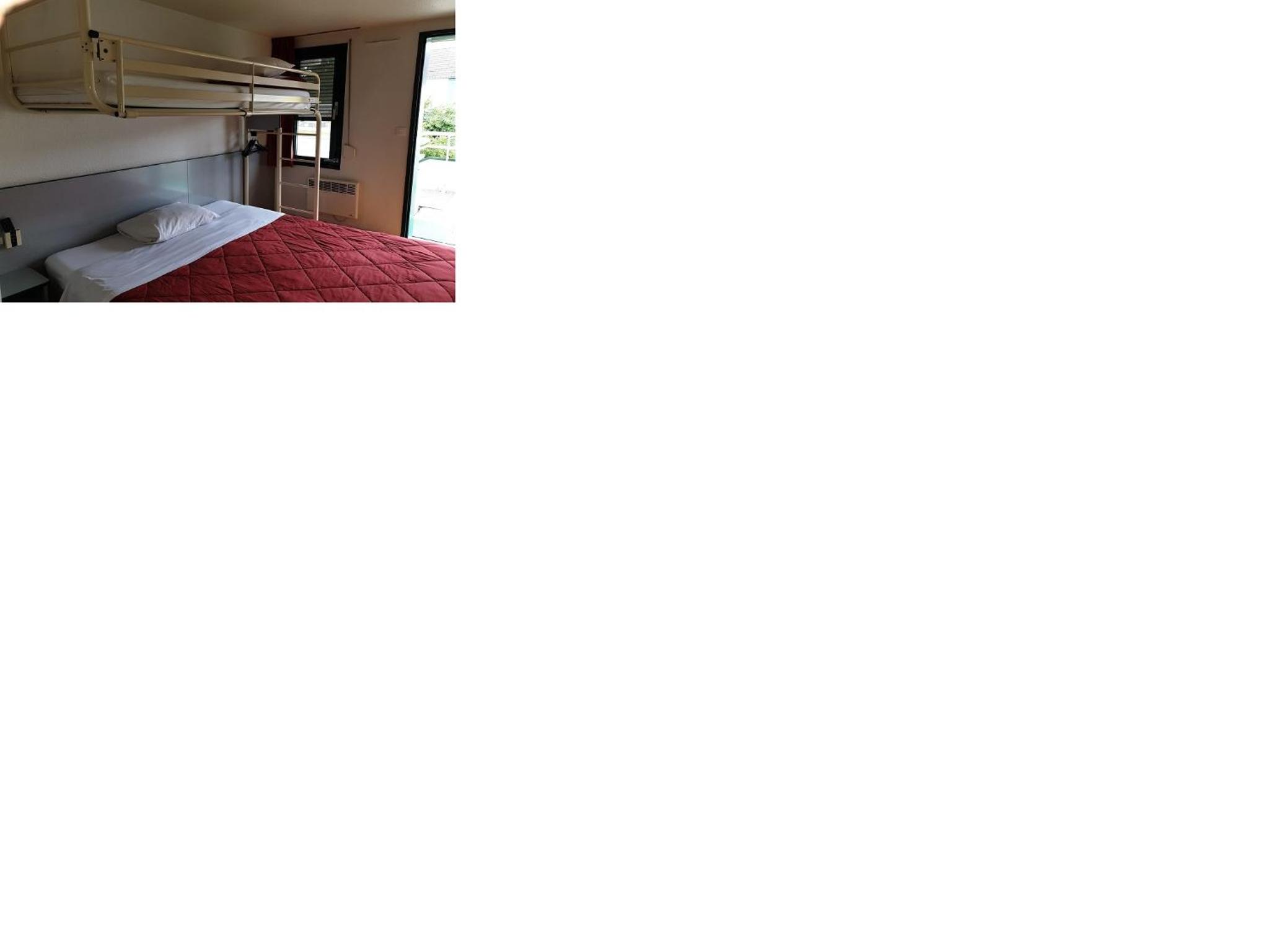 Standard Room - 1 Queen Bed 1 Bunk Bed - Photo 2