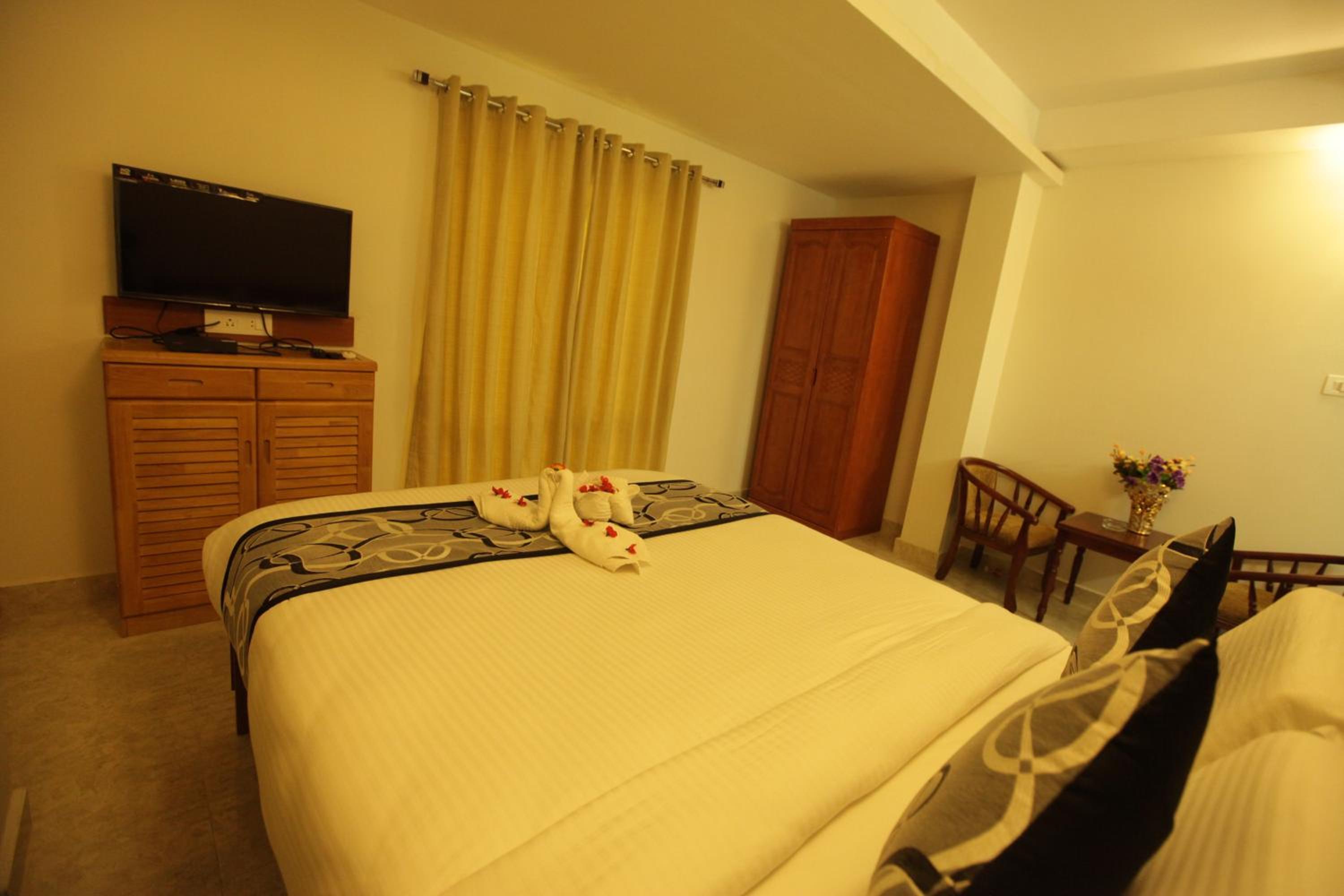 Deluxe Room - Photo 10