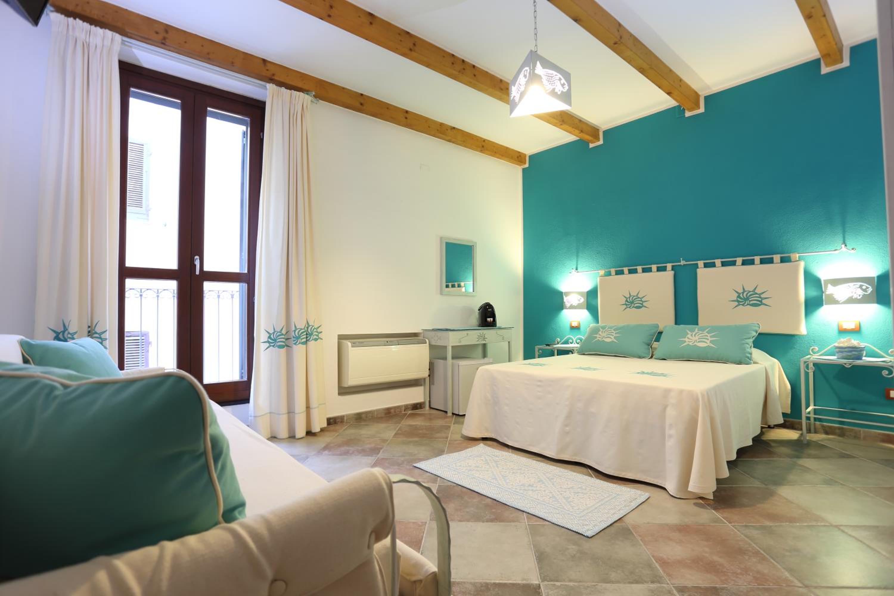Quadruple Room with Private Bathroom