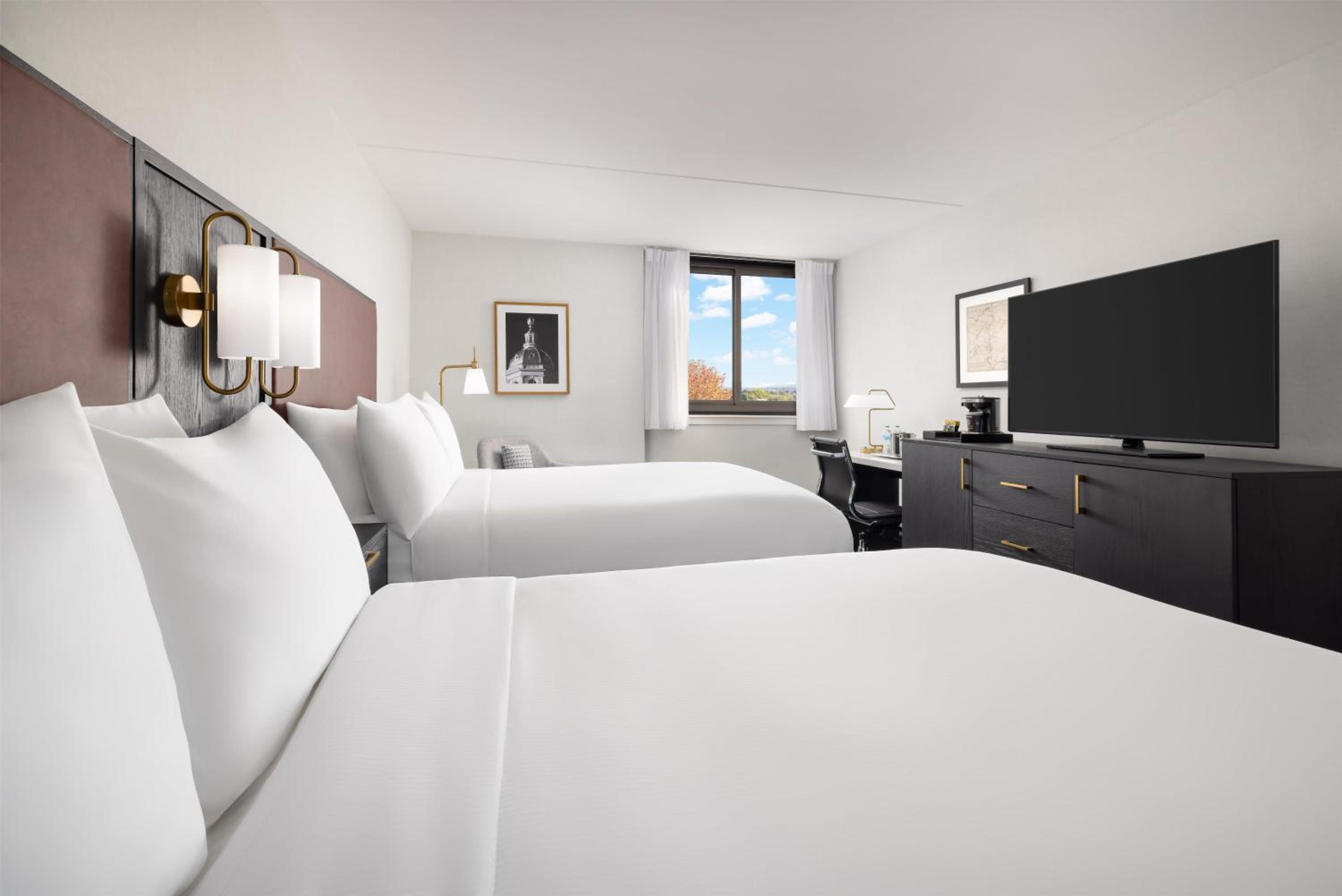 Corner Queen Room with Two Queen Beds - Photo 1