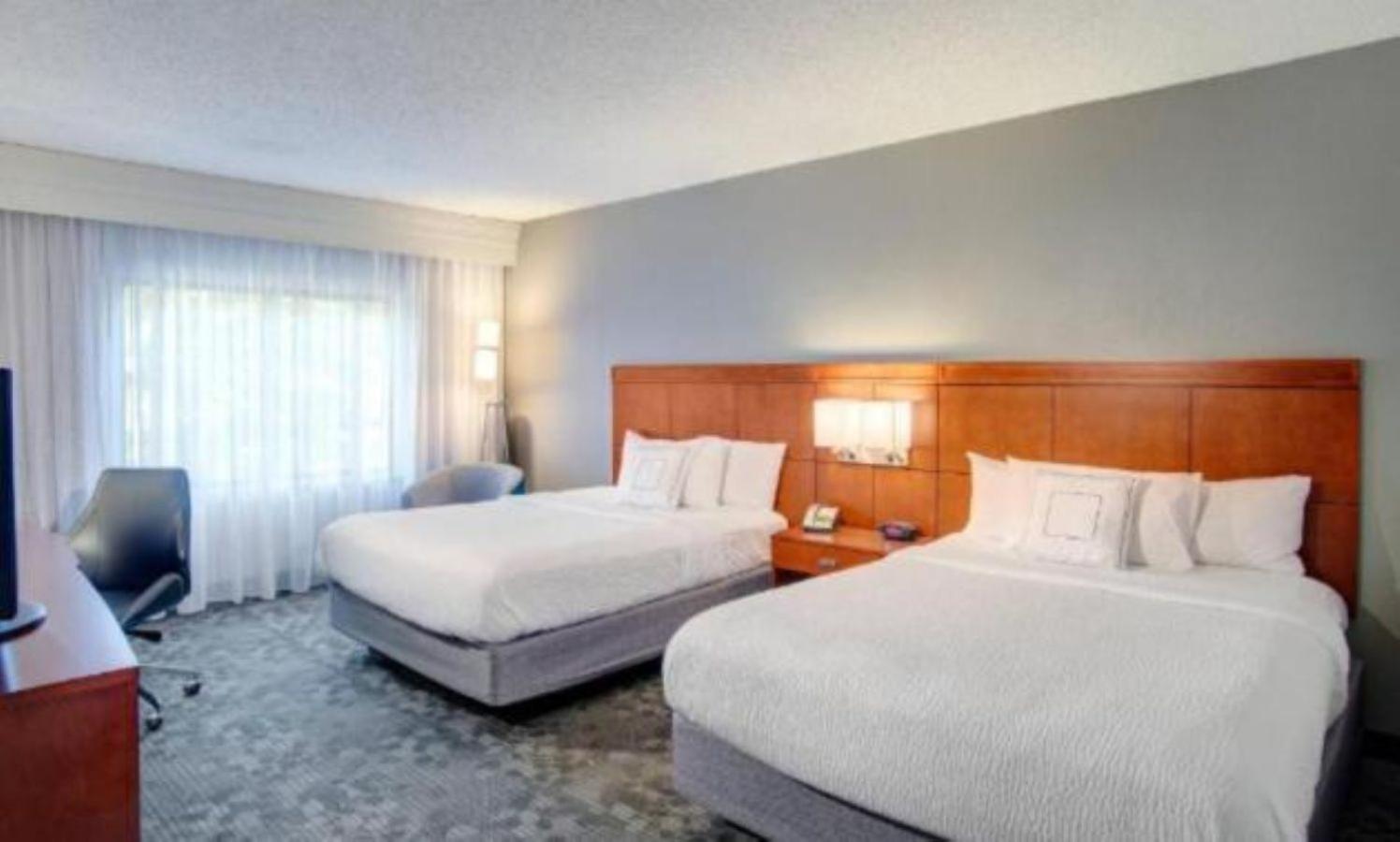 Queen Room with Two Queen Beds and Adapted Tub - Mobility and Hearing Accessible photo 1