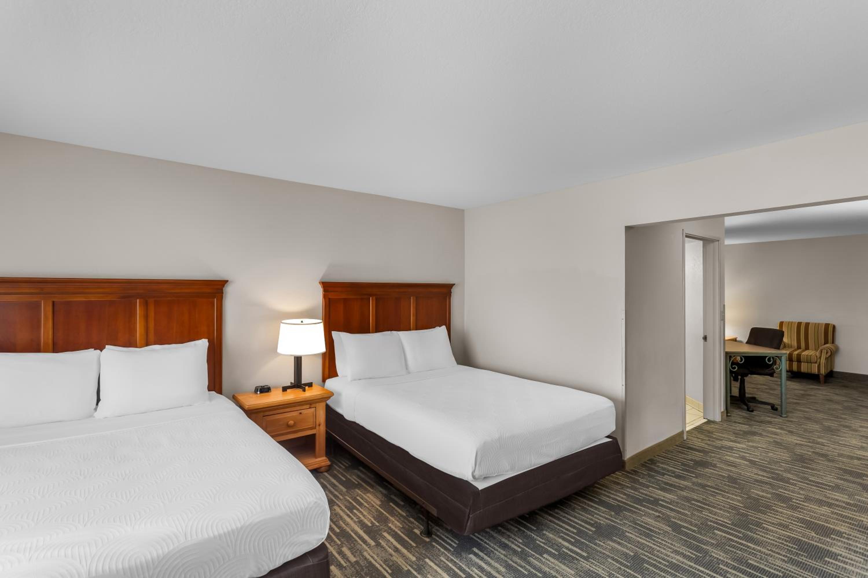 Queen Suite with Two Queen Beds and Sofa bed - Disability Access/Non Smoking - Photo 1