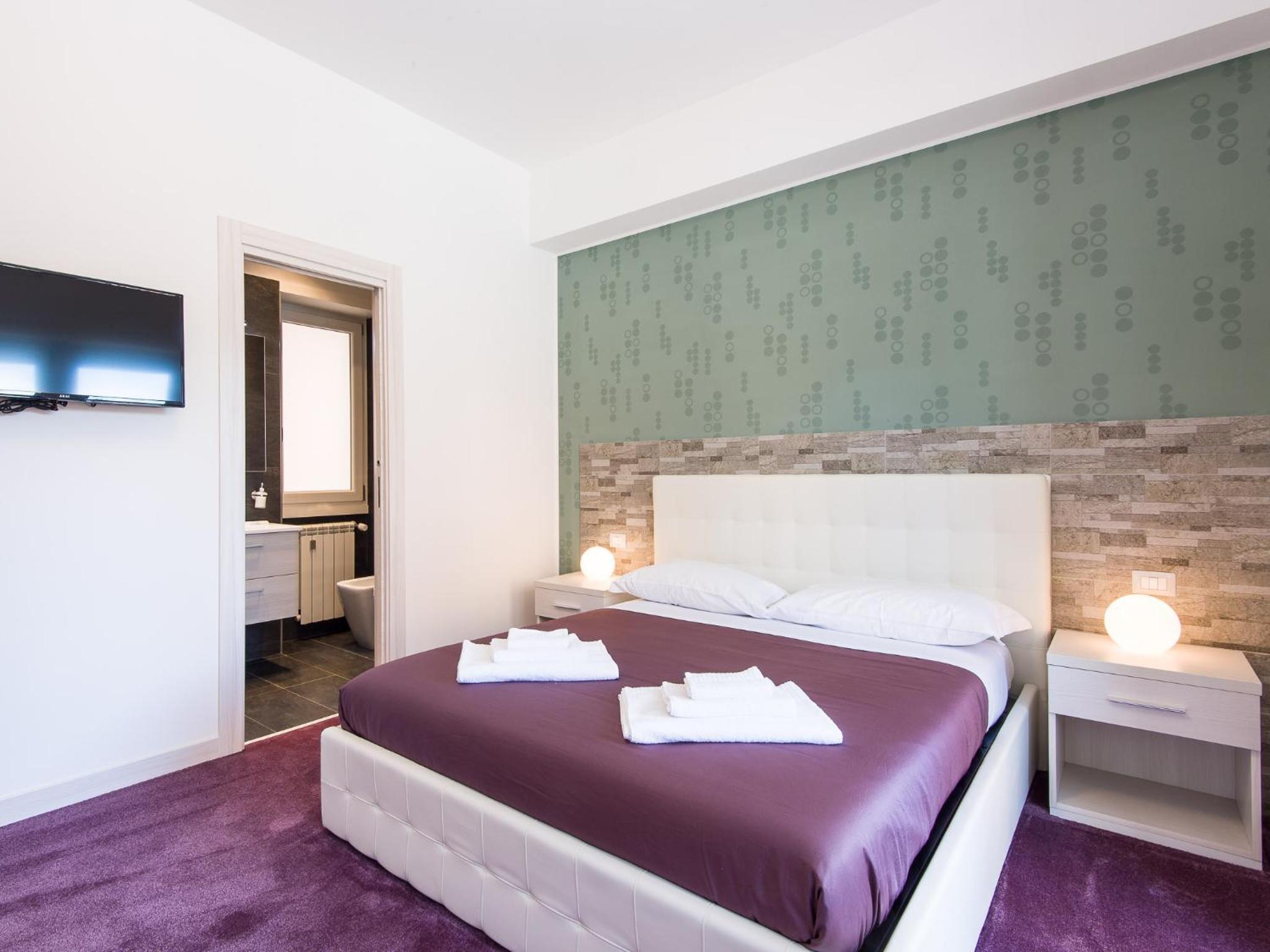 Quadruple Room with Private Bathroom and Balcony photo 1