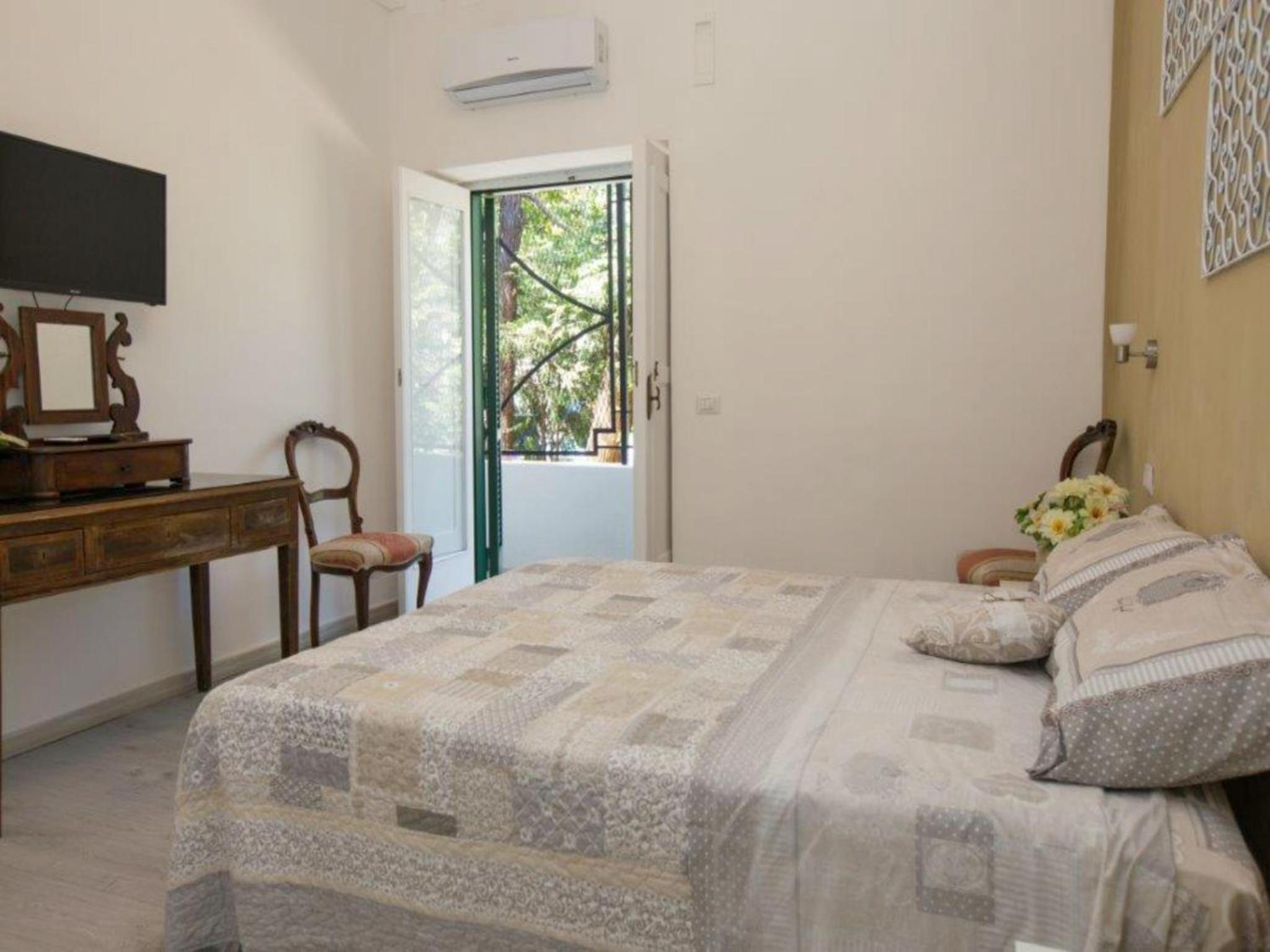 Deluxe Triple Room - Photo 12