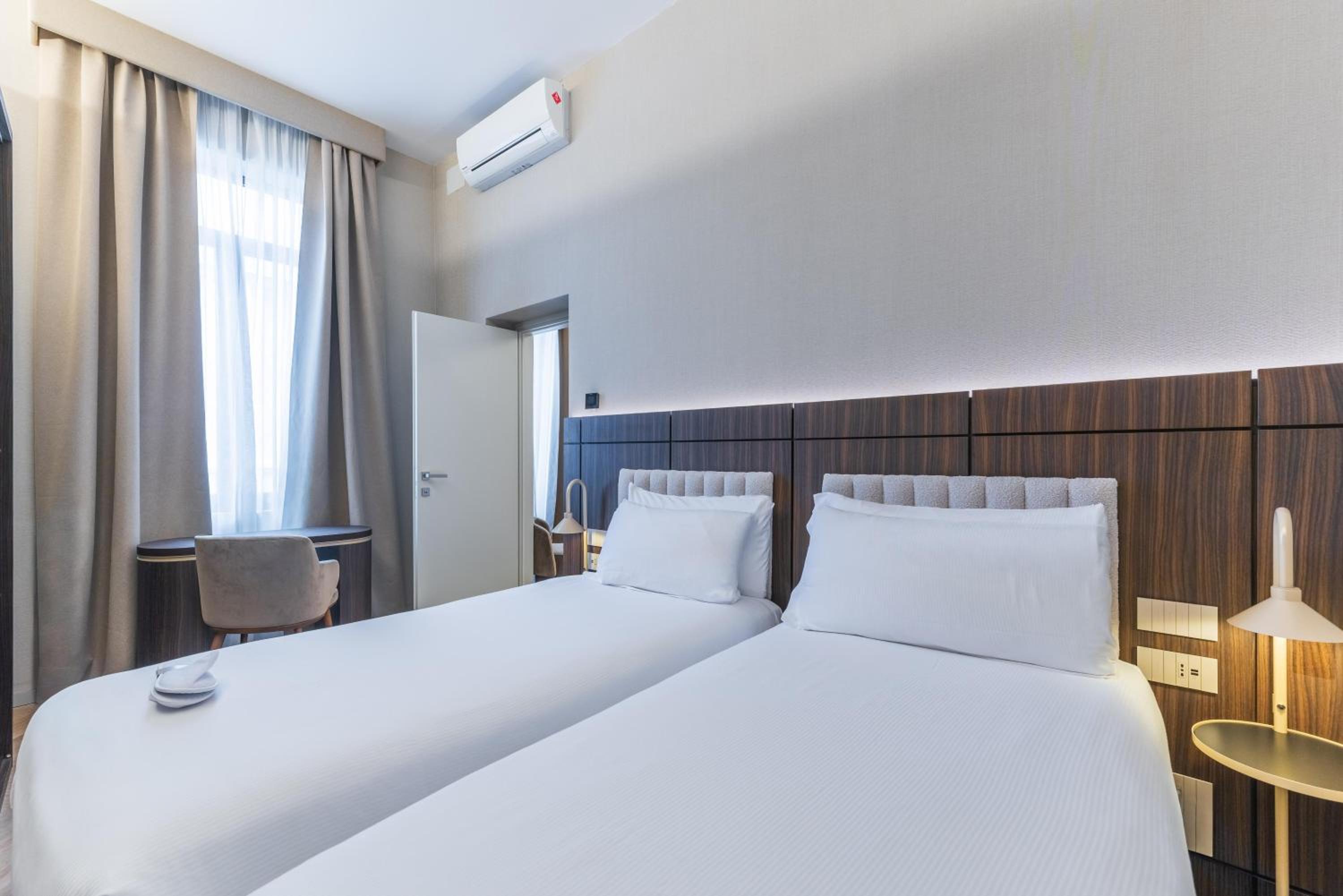 Two-Bedroom Family Suite with One King Bed and Two Single Beds - Non-Smoking thumbnail 6