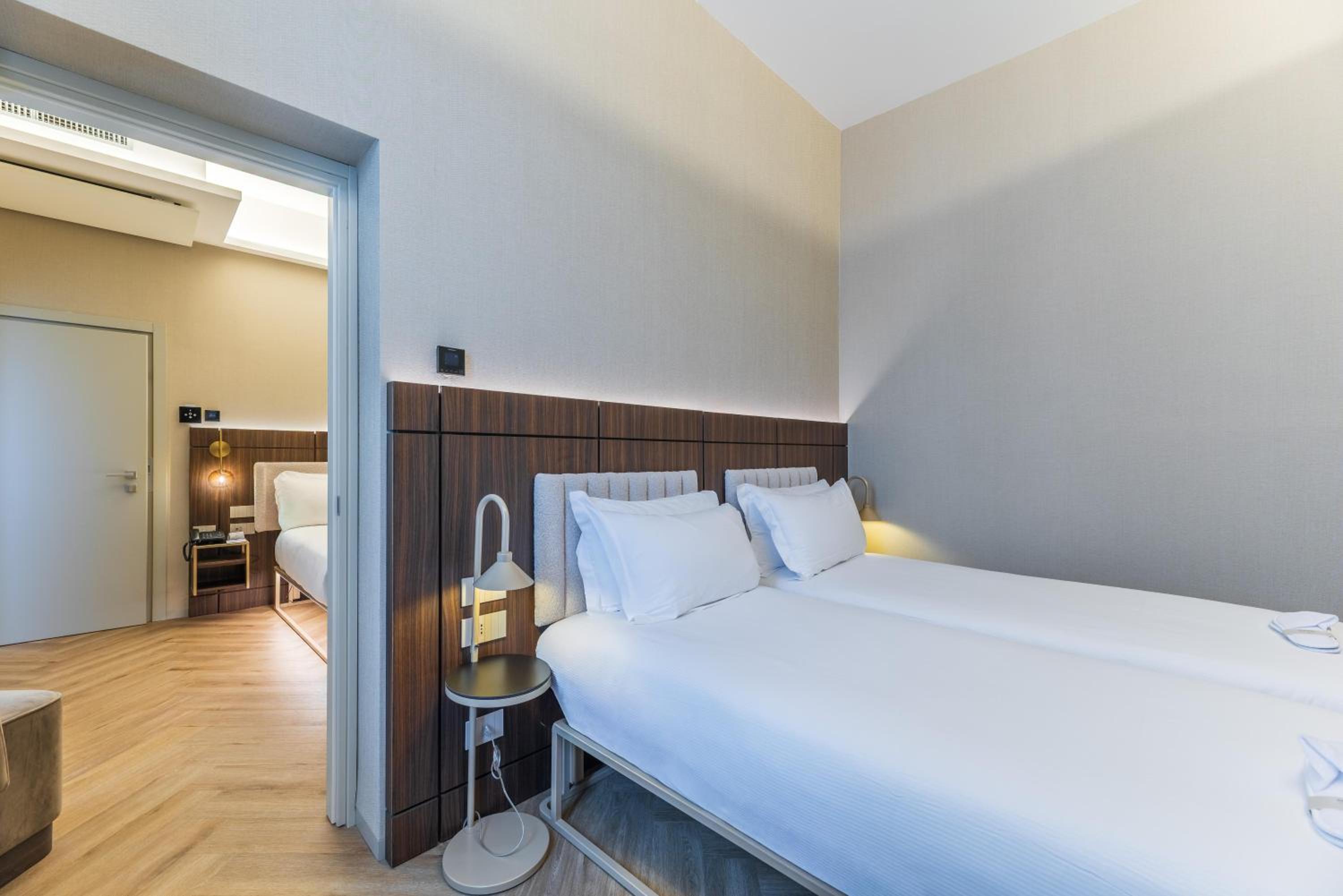 Two-Bedroom Family Suite with One King Bed and Two Single Beds - Non-Smoking