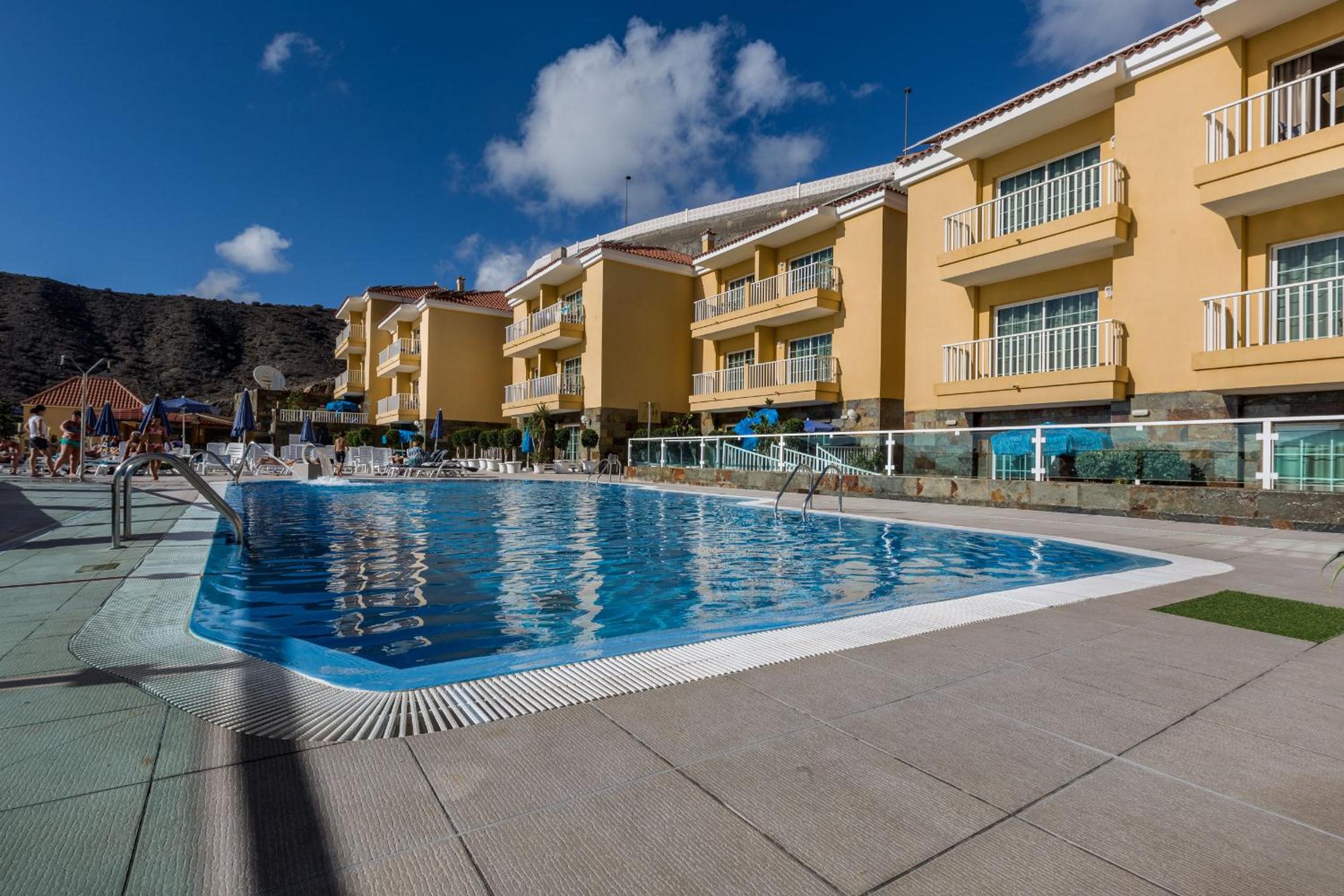 Apartment with Balcony and Pool View