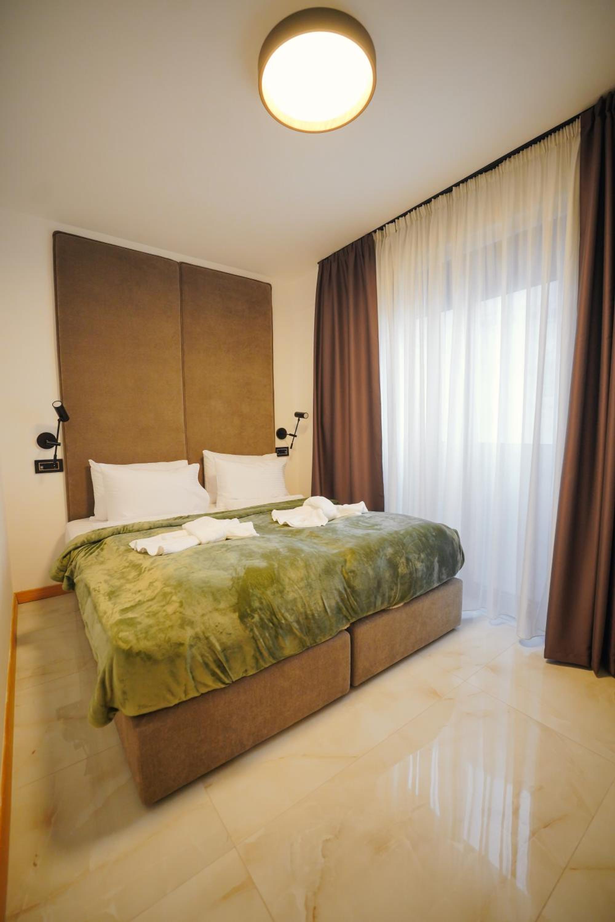 Premium Two-Bedroom Apartment with Balcony, Terrace and Free Spa Access