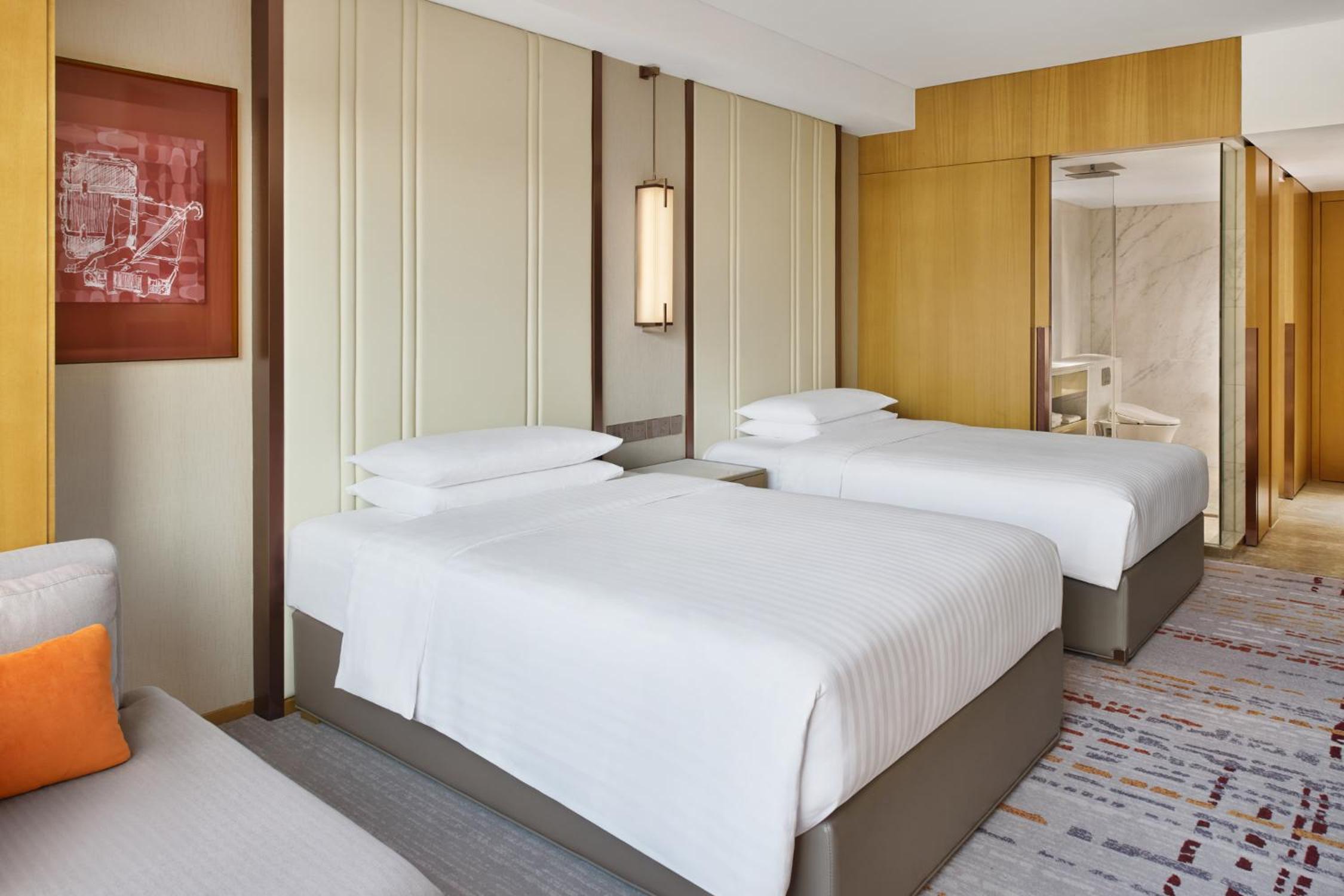 Deluxe Room with Two Double Beds and City View photo 2